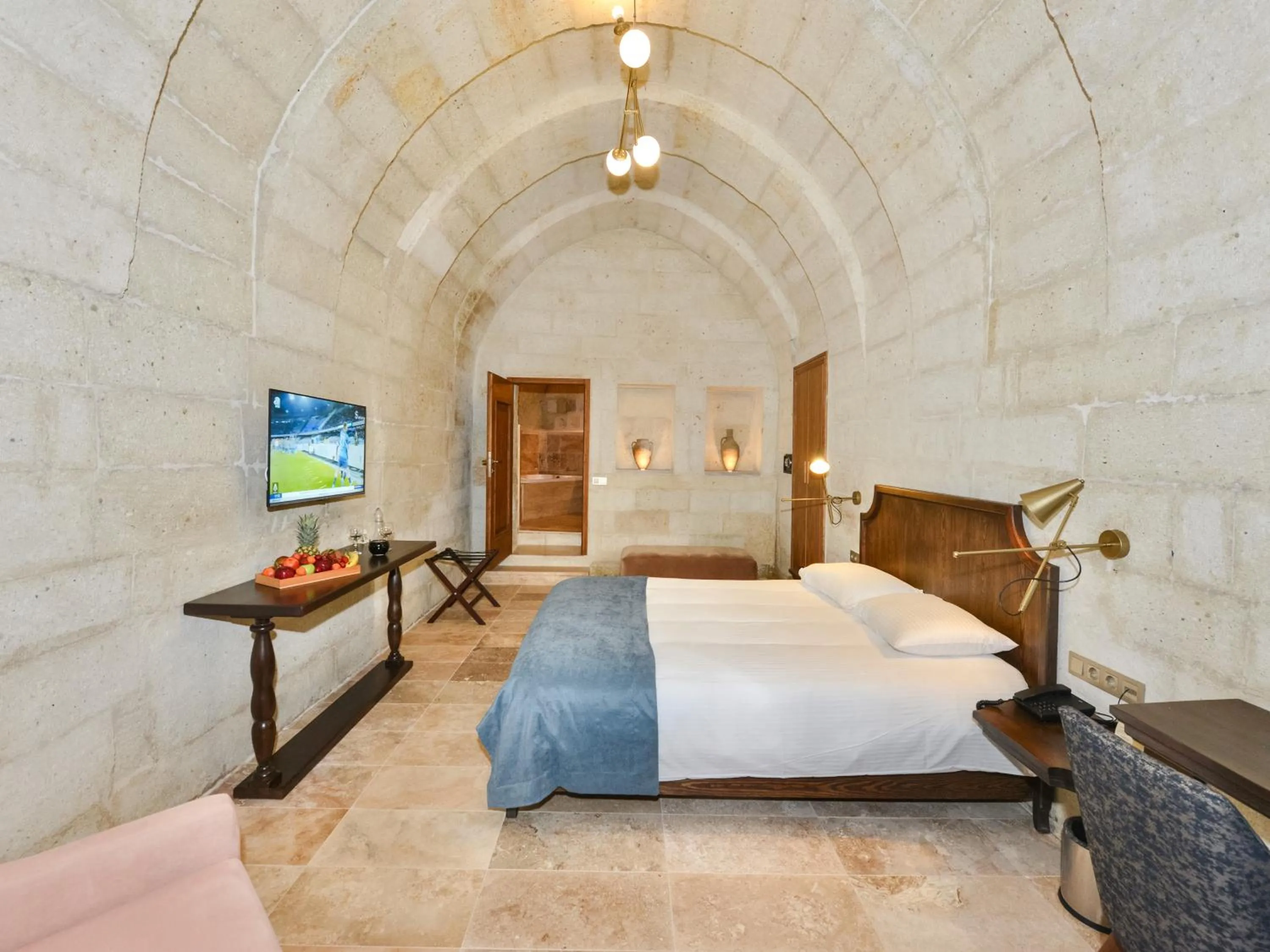 Bed in Evanthia Cave Suites - Special Class