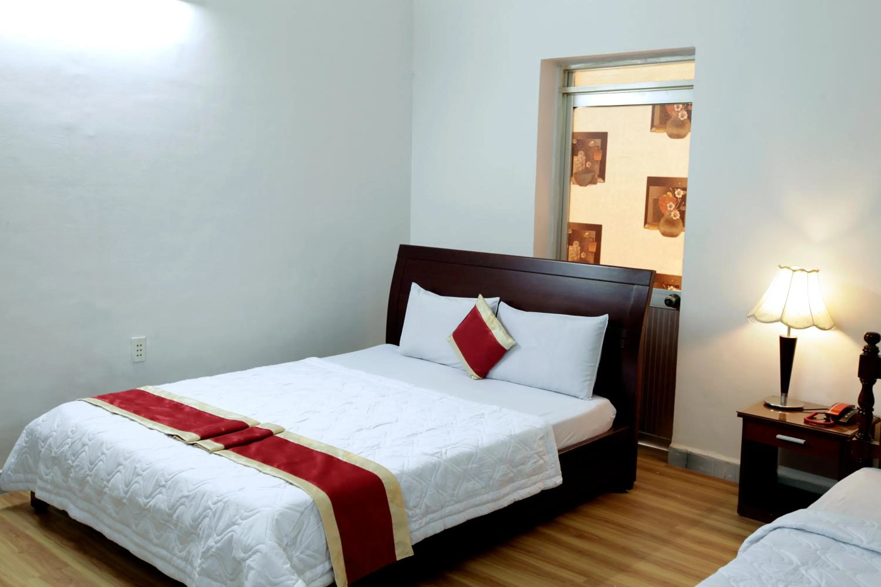 Photo of the whole room, Bed in Tan Da Hotel