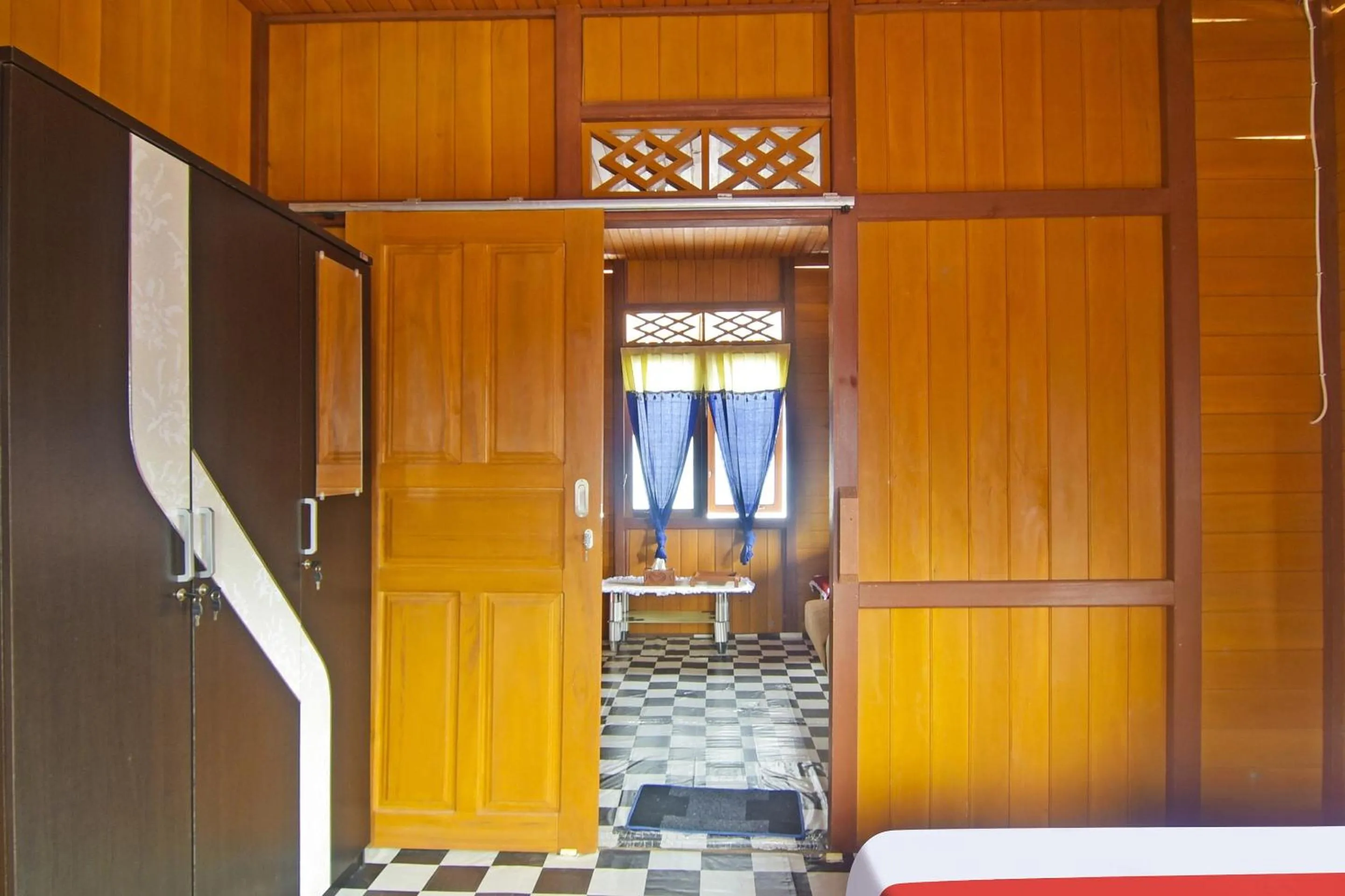 Bedroom in Hotel O Pulisan Ekowisata Homestay Near Wisata Pantai Desa Pulisan (Pulisan Beach Tour)