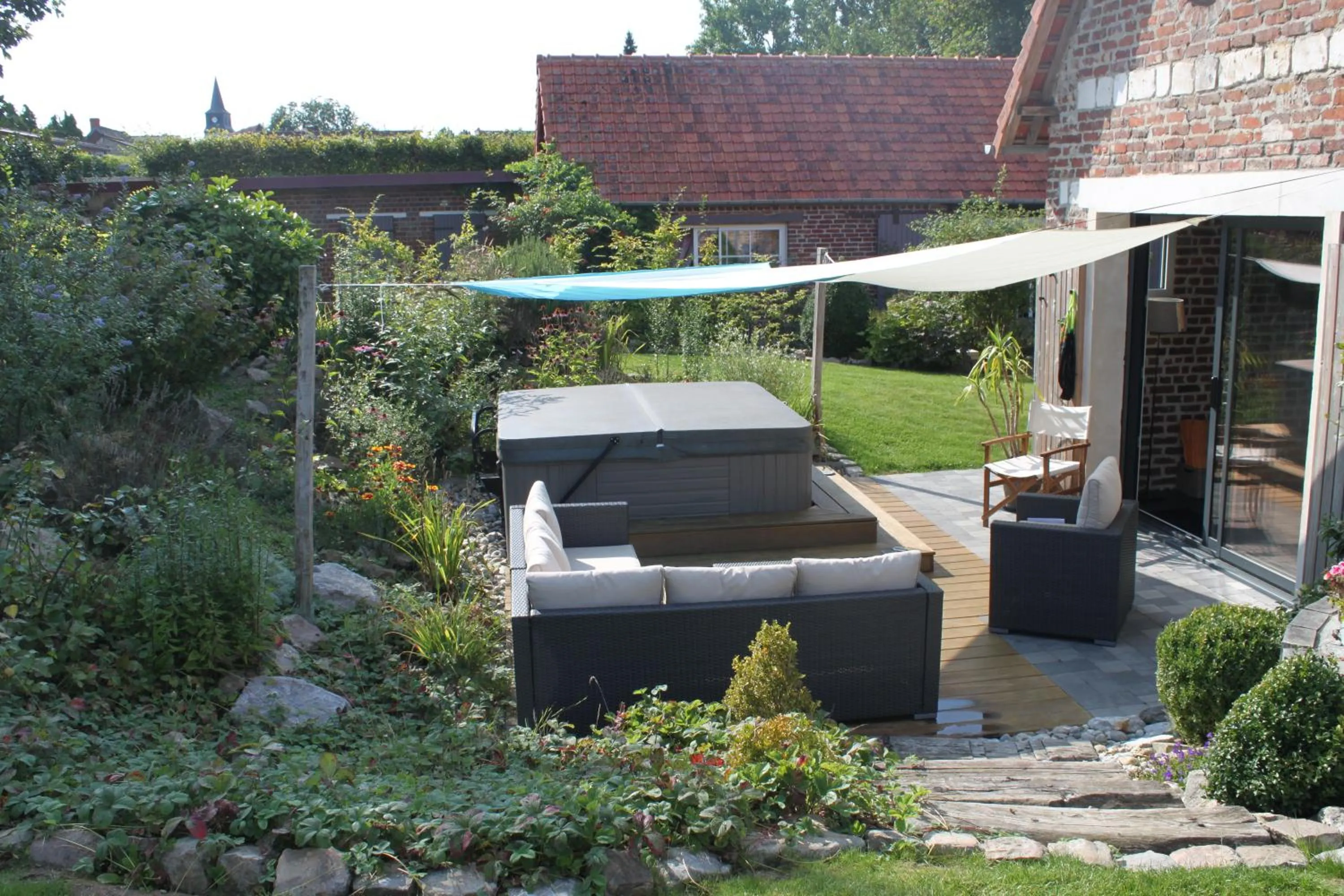 Spa and wellness centre/facilities in Chambres d'hôtes L'Aubaine avec jacuzzi