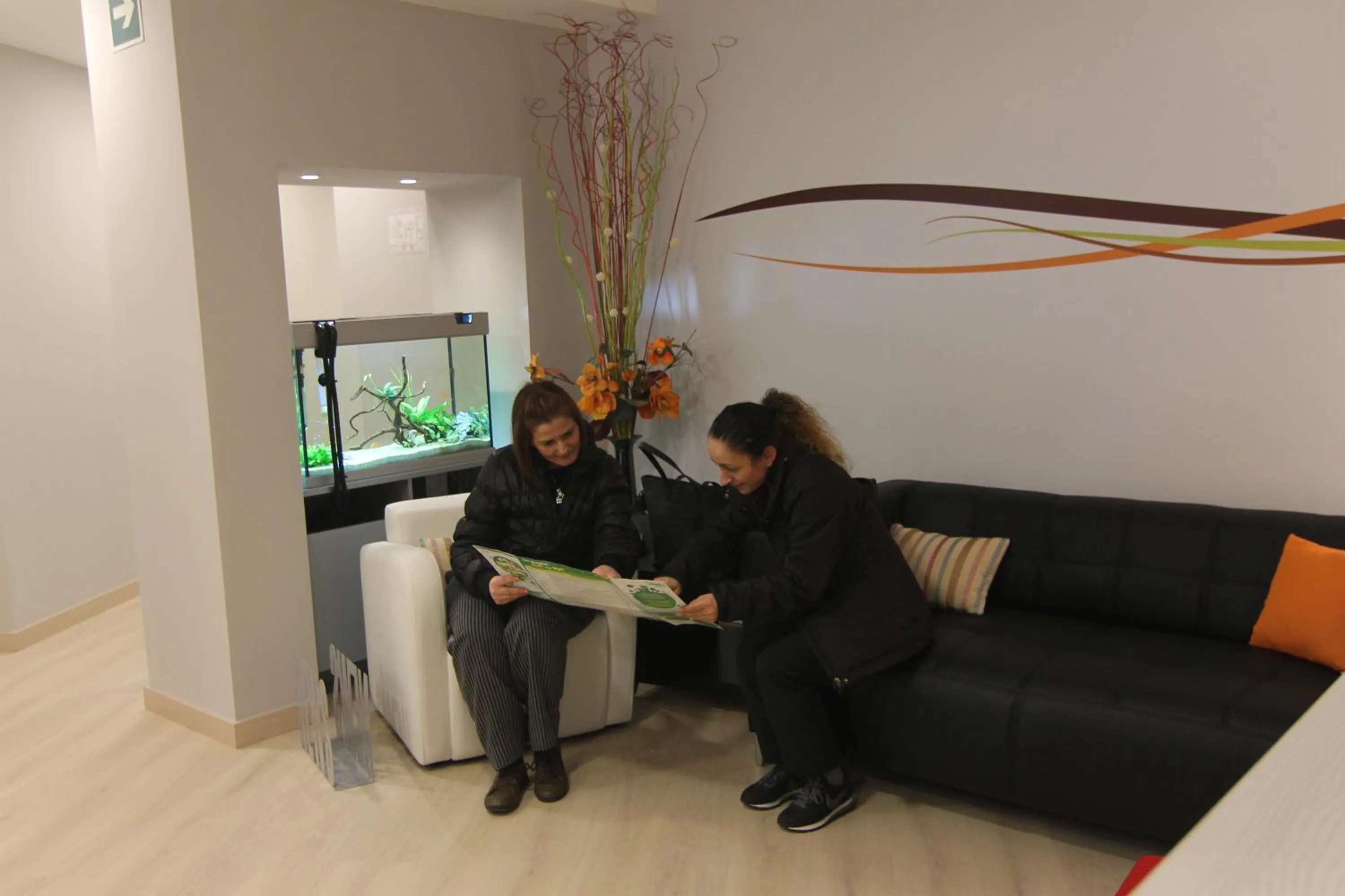 Communal lounge/ TV room in Hostal Aslyp 114