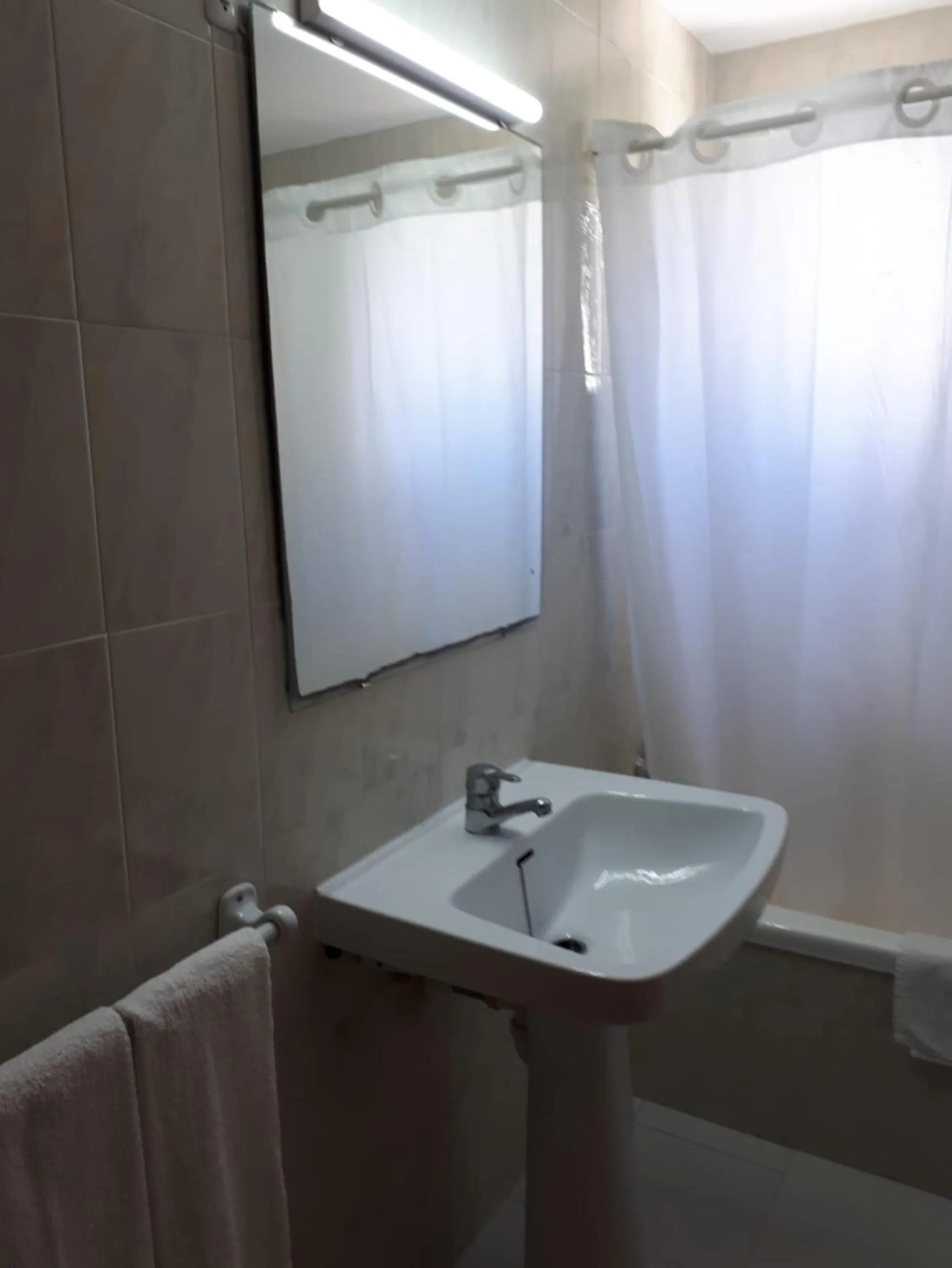 Bathroom in Apartamentos Llevant