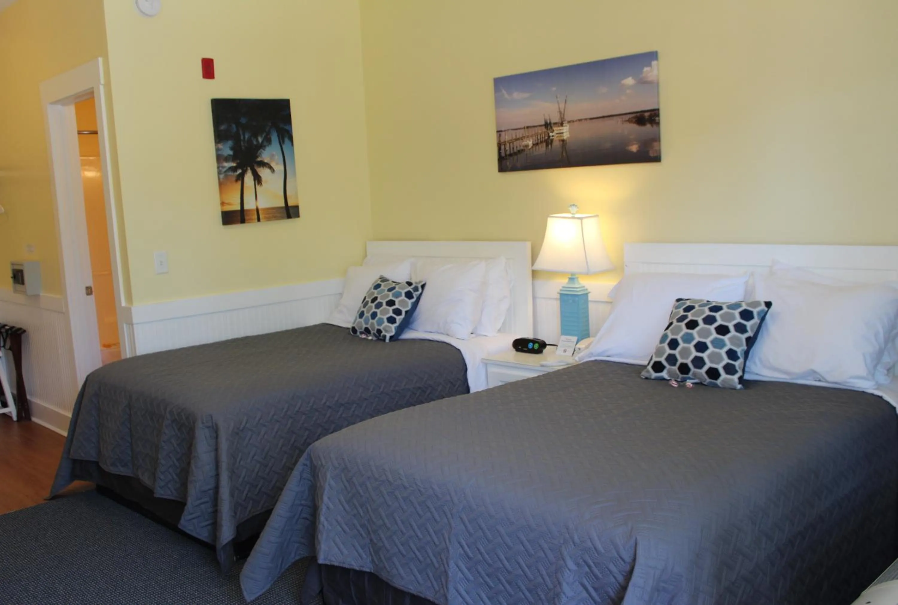 Bed in Topsail Shores Inn