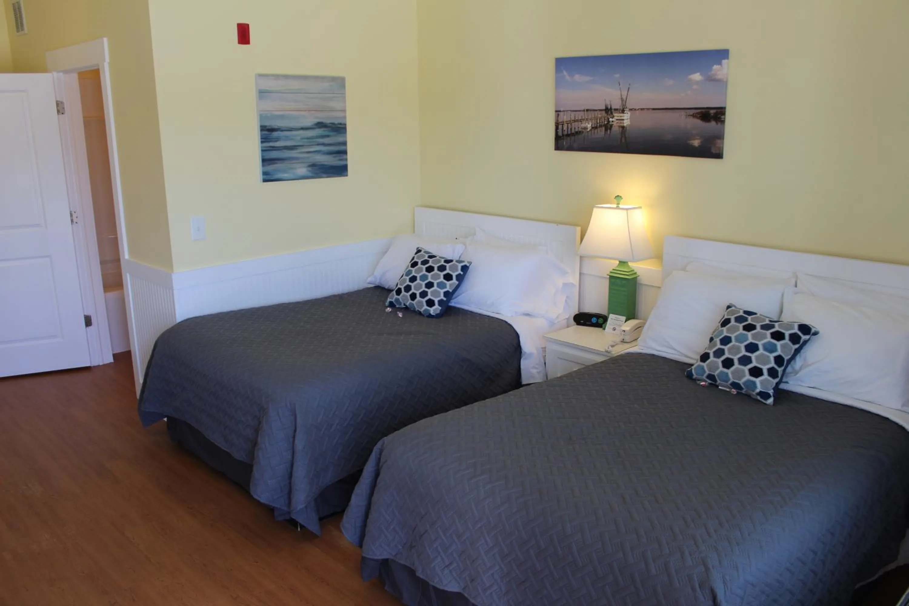 Bed in Topsail Shores Inn