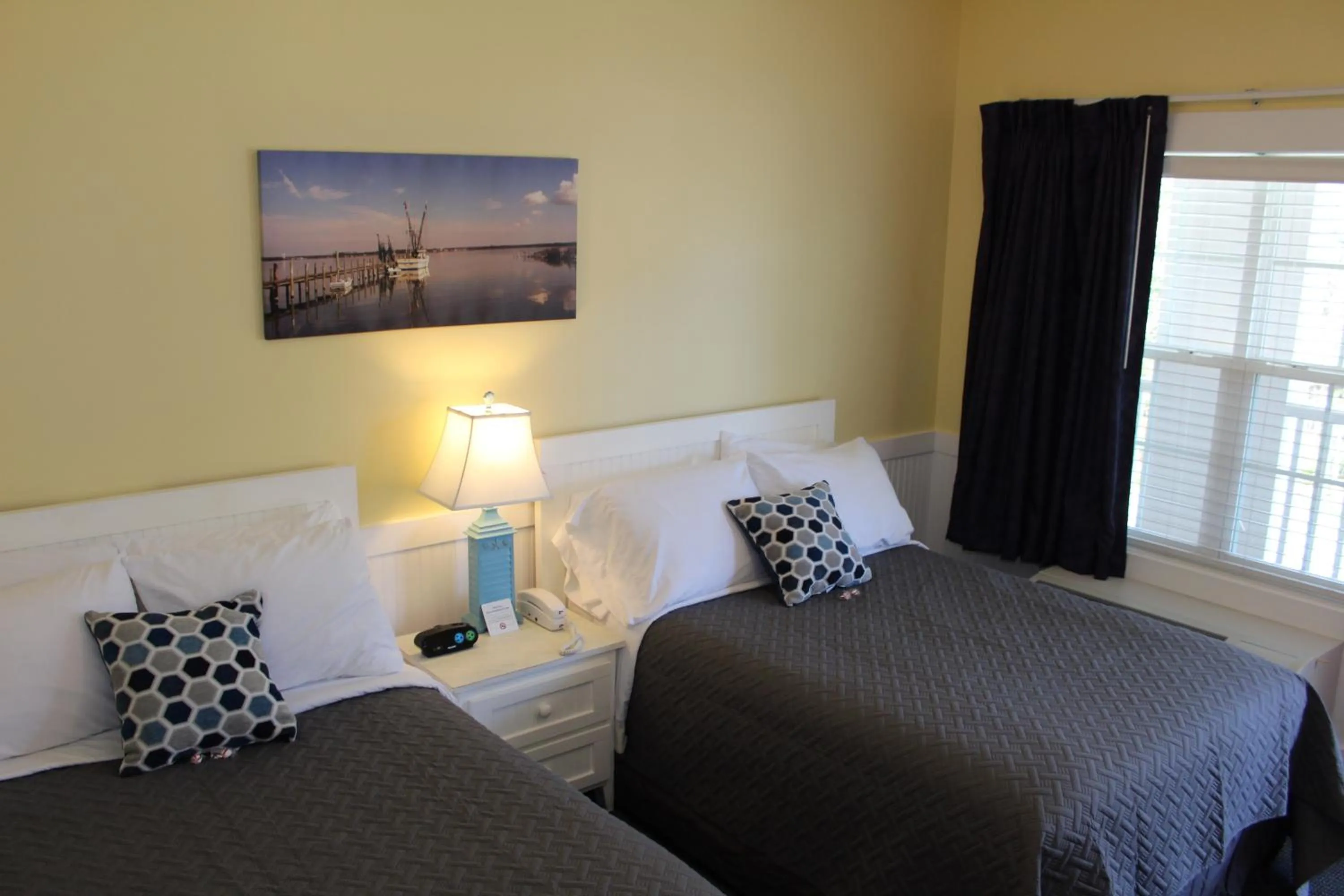 Bed in Topsail Shores Inn