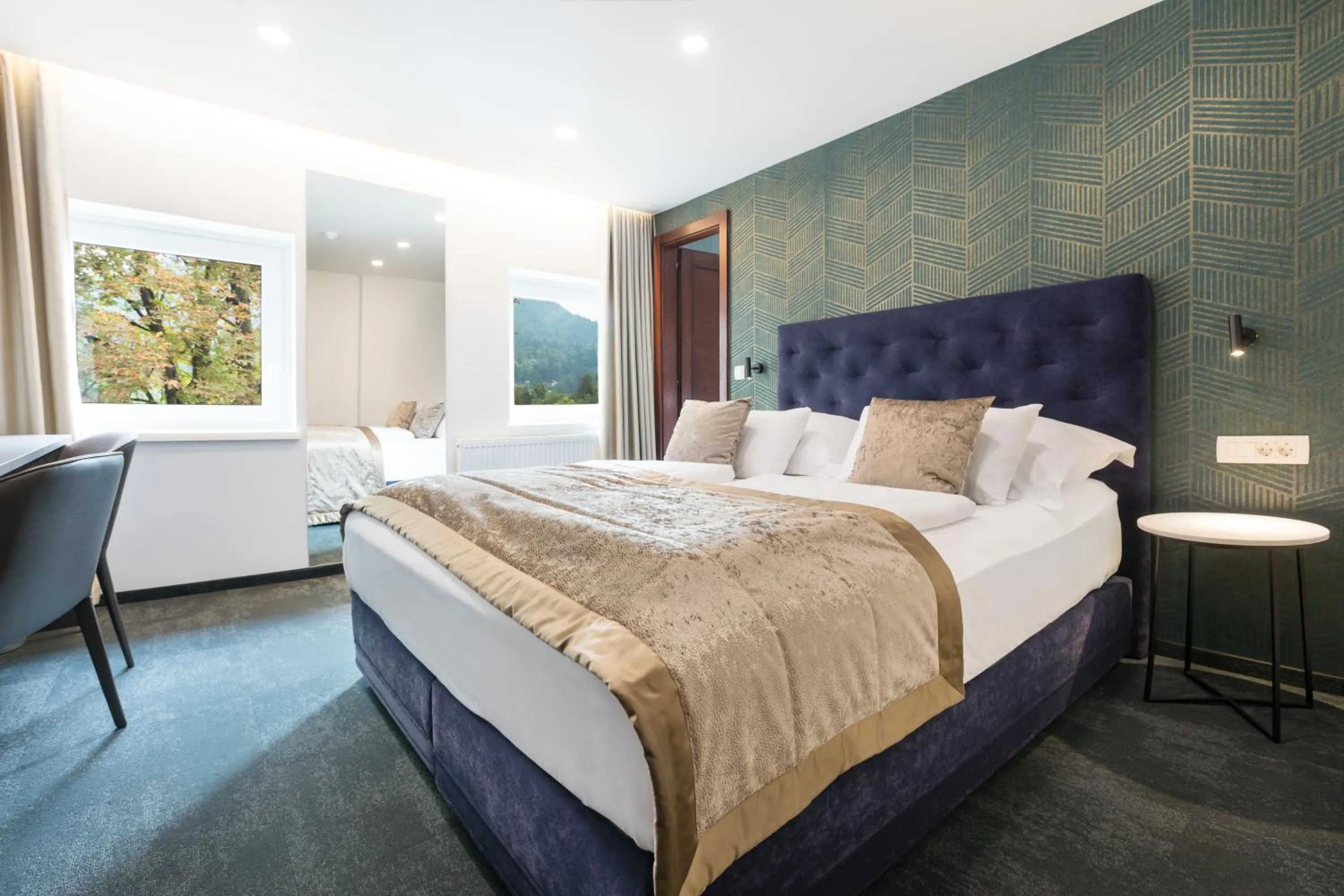 Bed in Garni Hotel Cirman