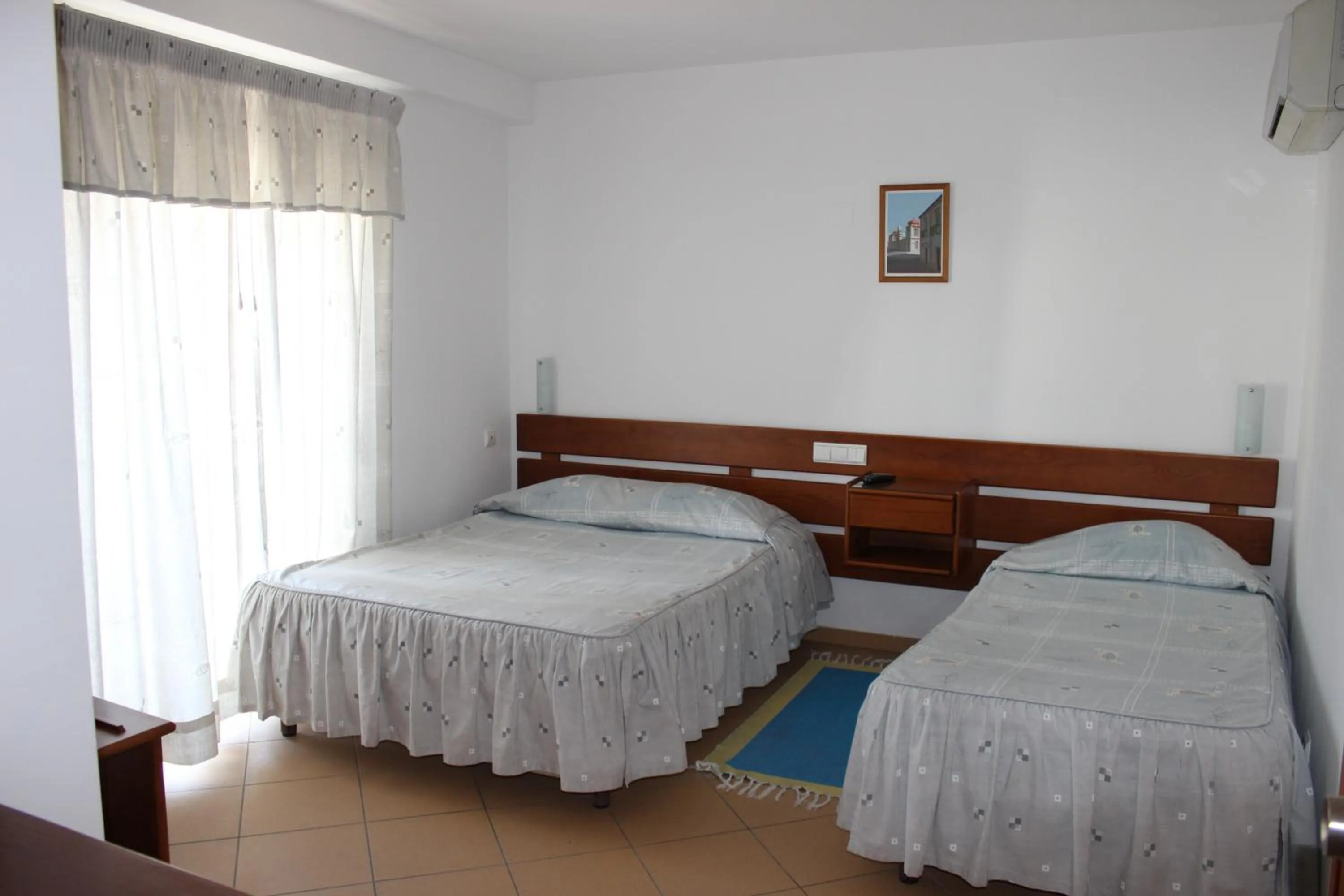 Triple Room in Dom Fernando I