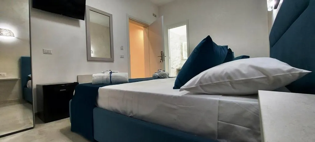 Bed in IL GIGLIO B&B