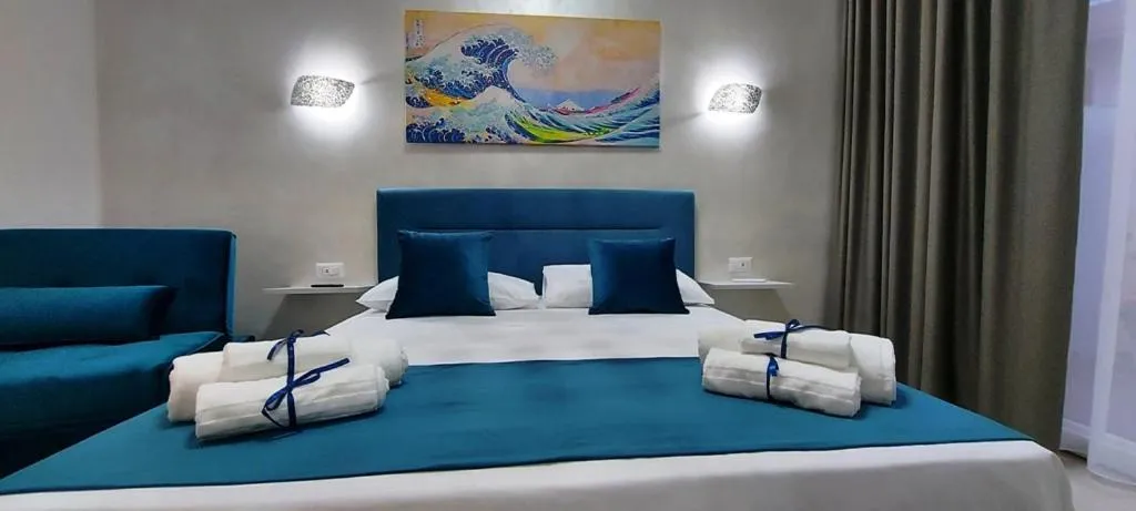 Bed in IL GIGLIO B&B