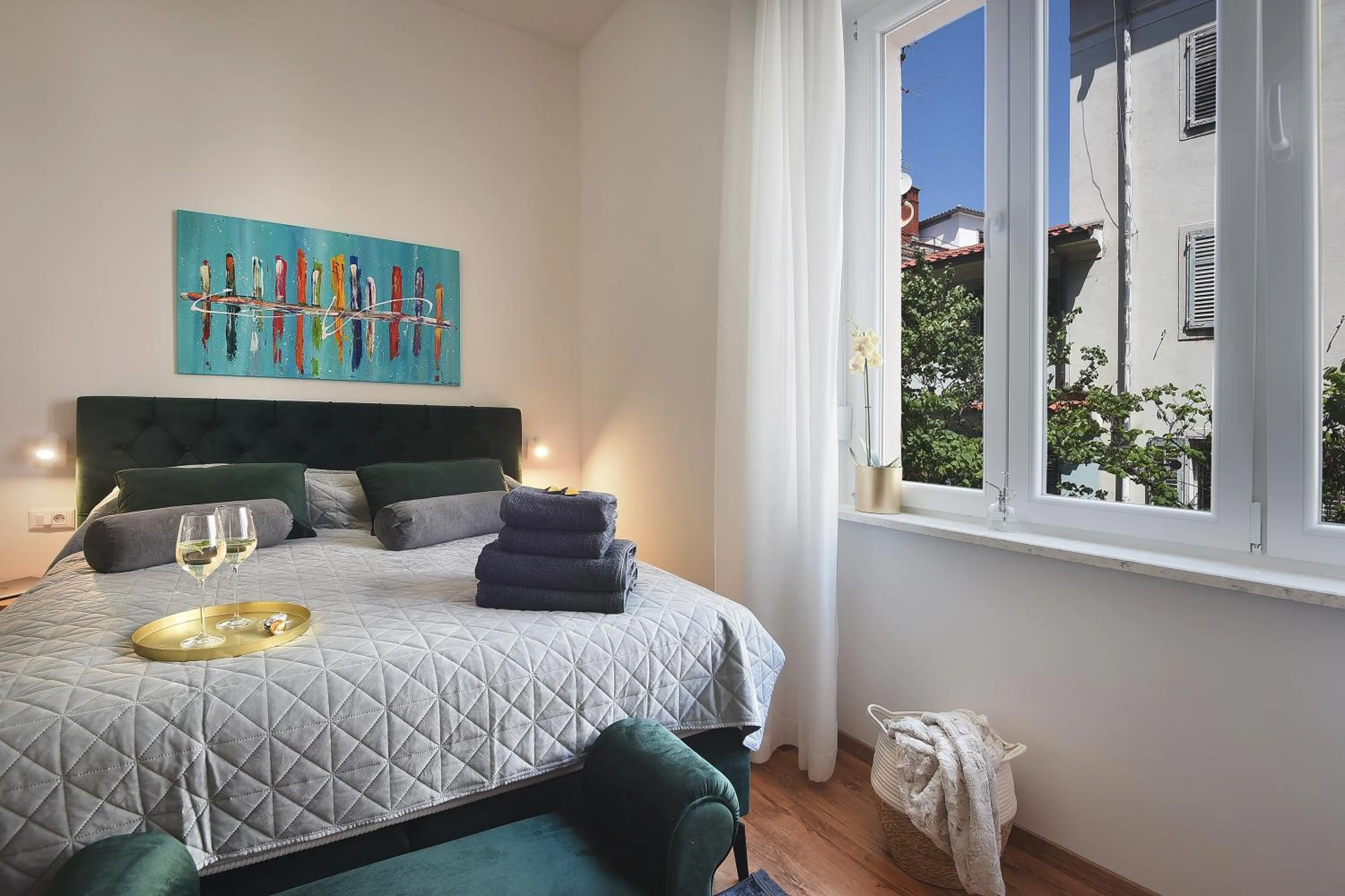 Bed in Emi Luxury Apartments