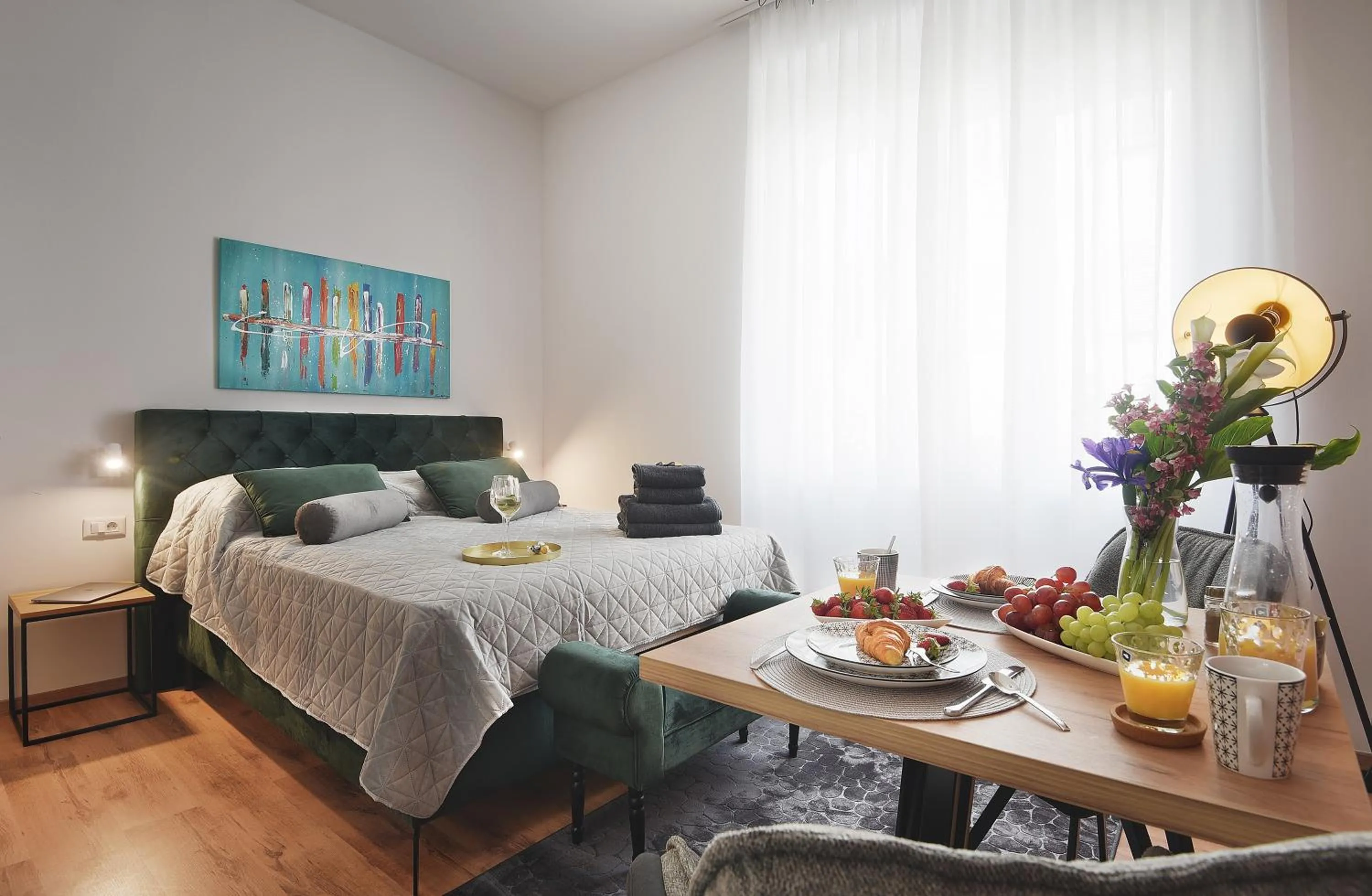Bed in Emi Luxury Apartments