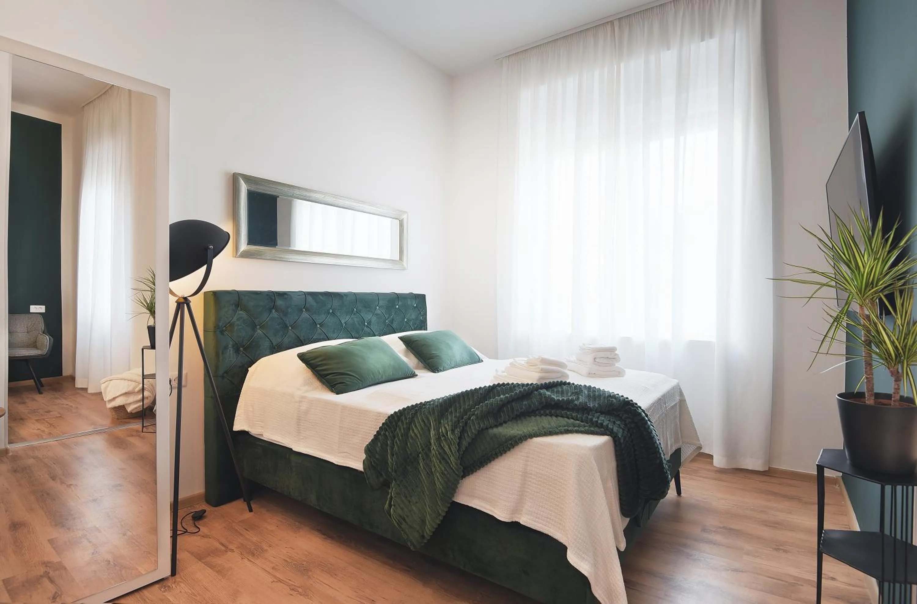 Bedroom, Bed in Emi Luxury Apartments