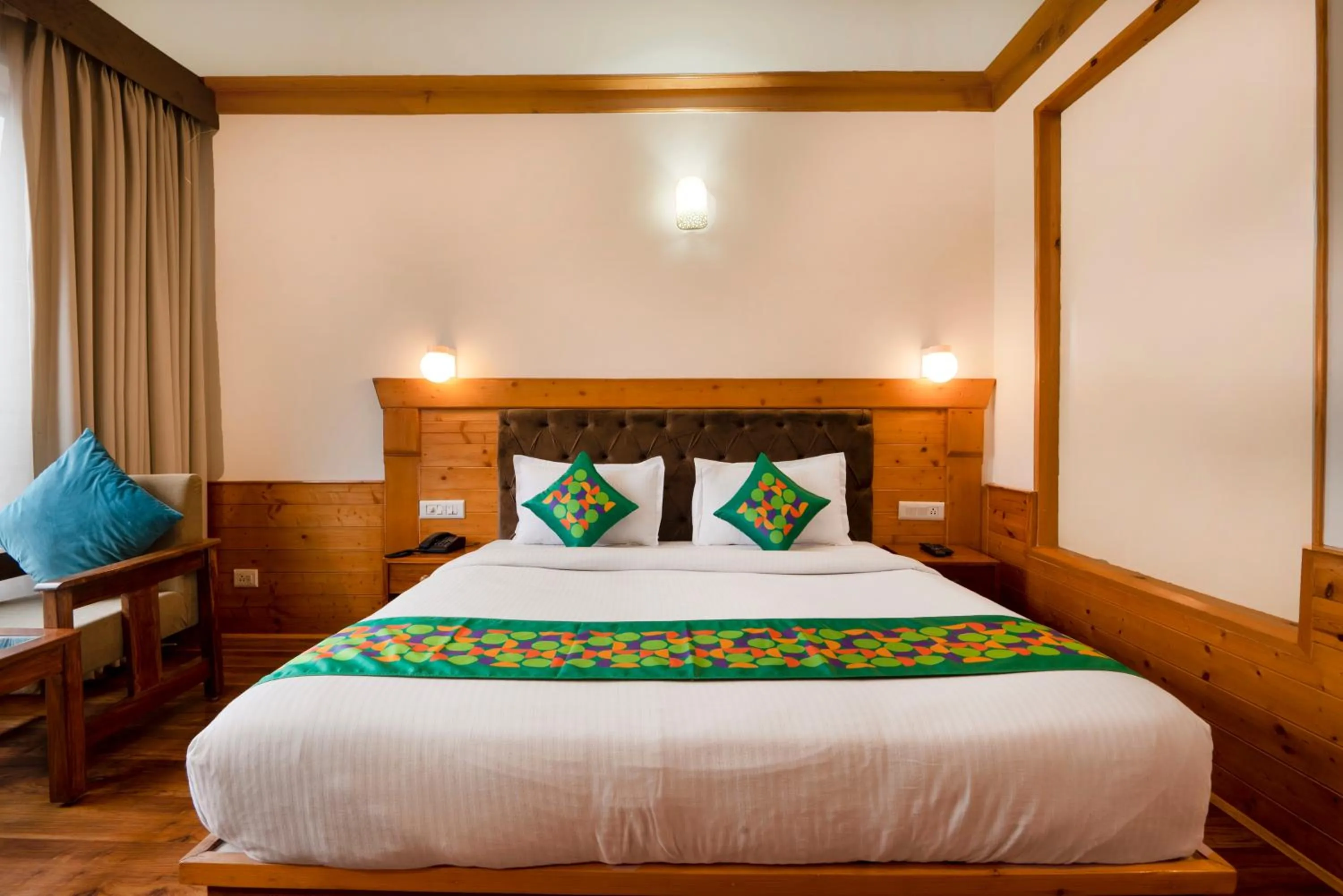 Bedroom, Bed in Treebo Premium Sattva With Mountain View