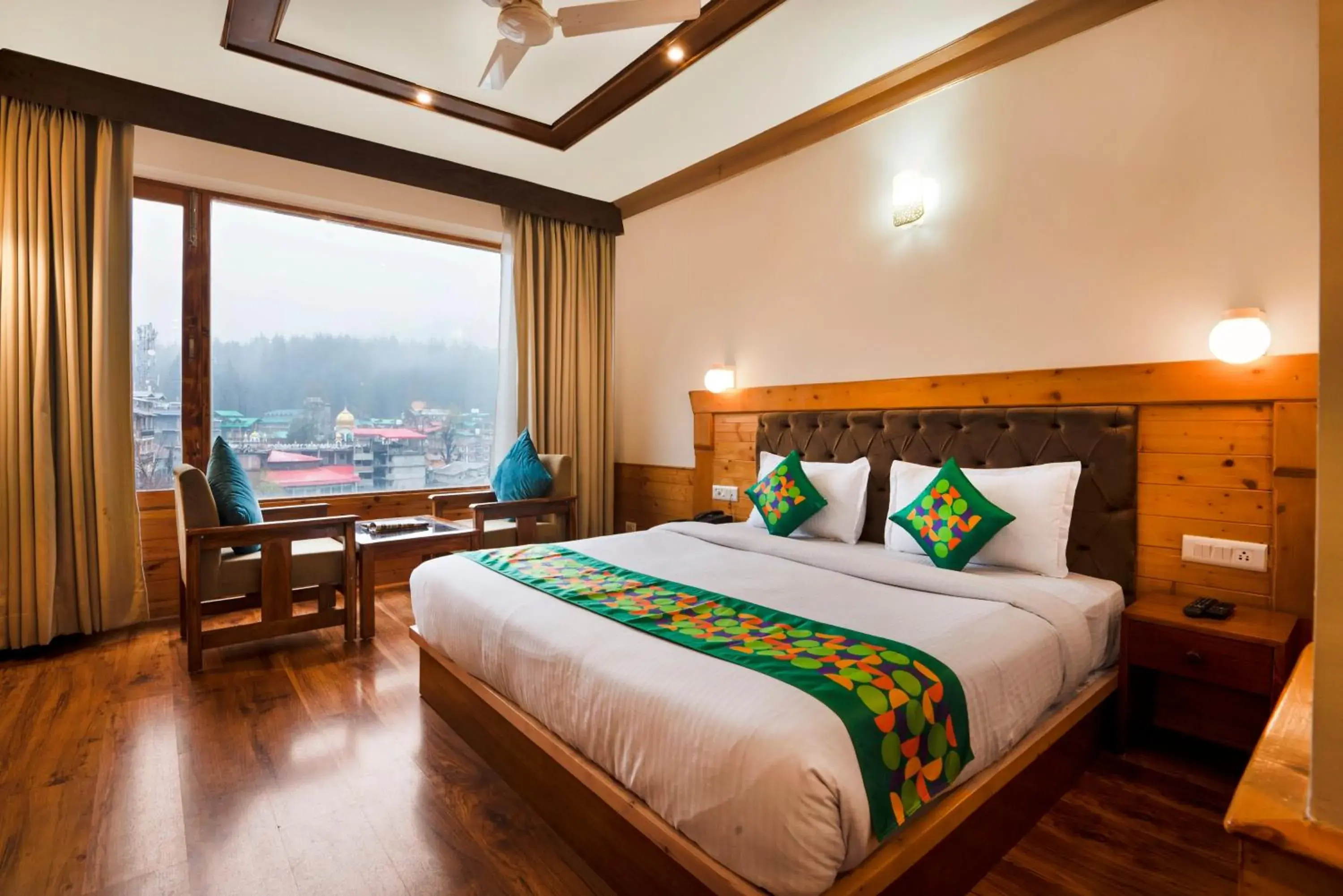Standard Room With Mountain View in Treebo Premium Sattva With Mountain View Standard Room With Mountain View in Treebo Premium Sattva With Mountain View