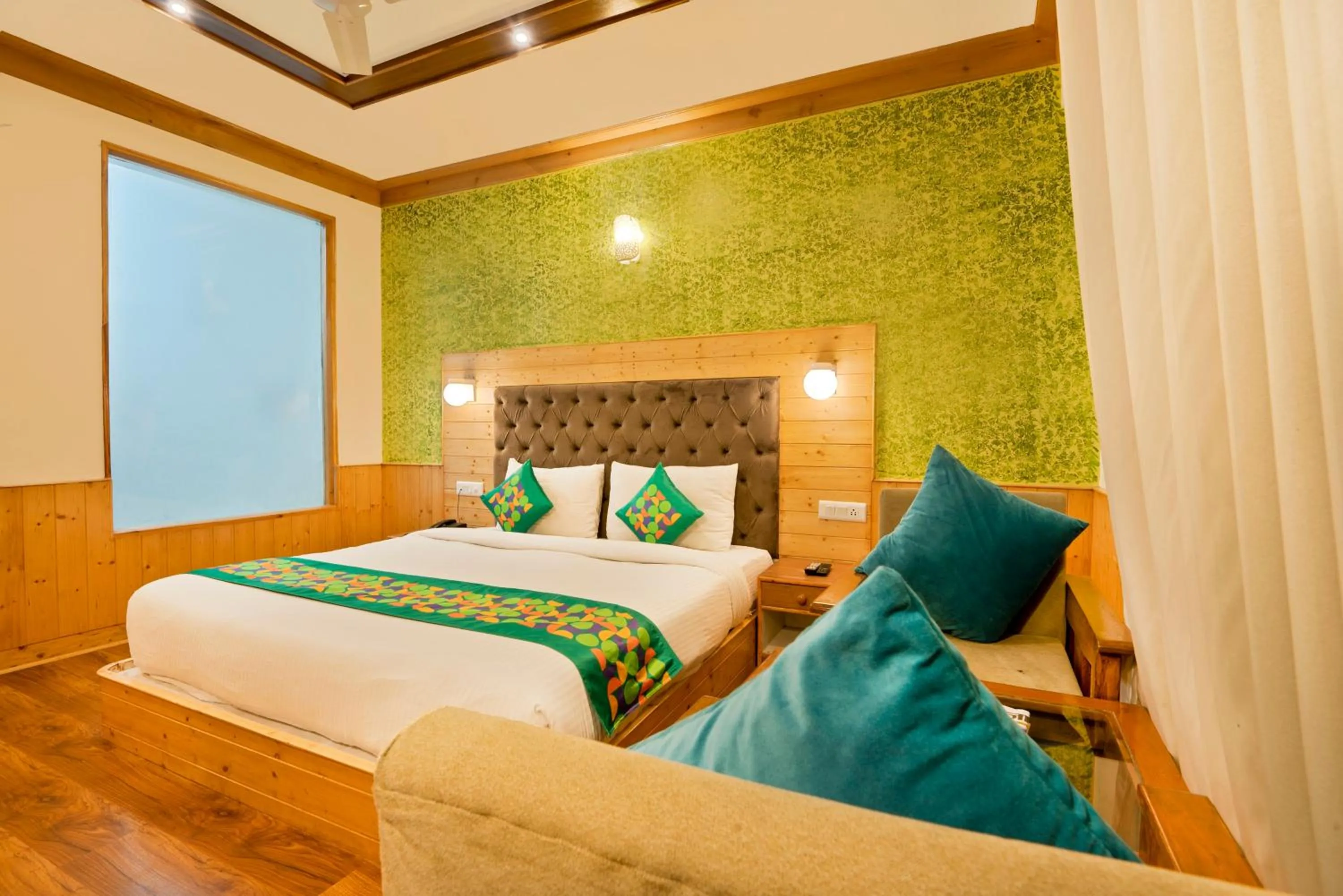 Bedroom, Bed in Treebo Premium Sattva With Mountain View