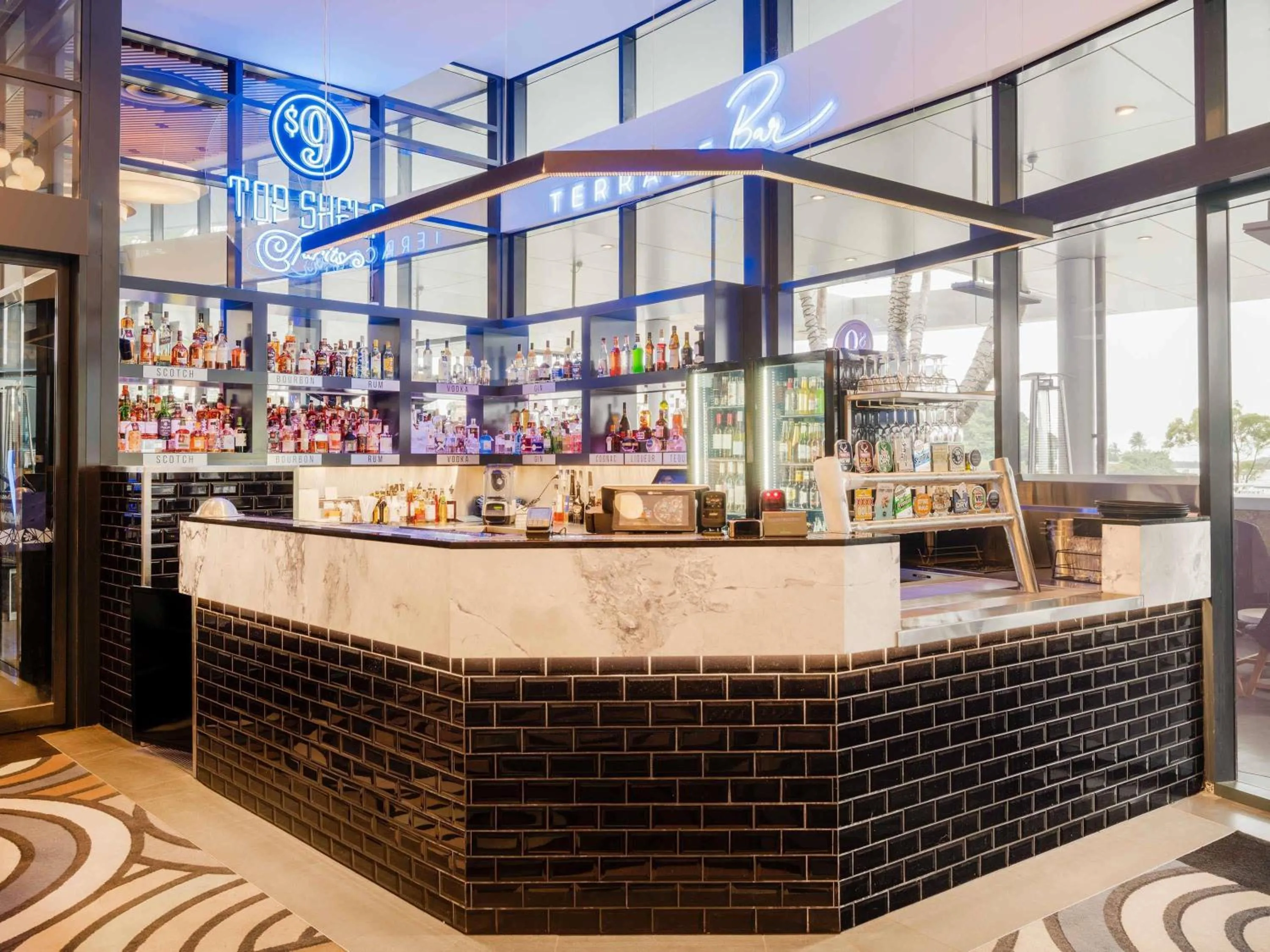 Lounge or bar in The Sebel Twin Towns