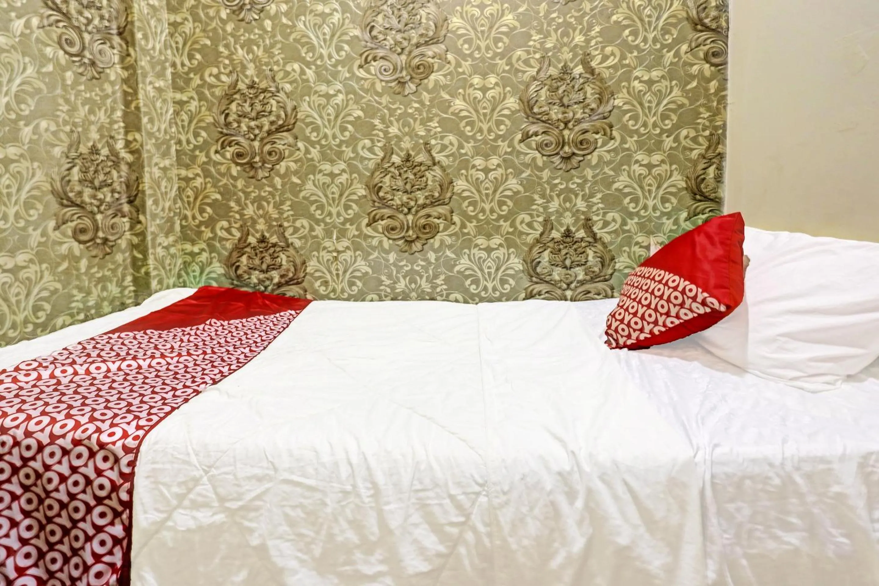 Bed in Hotel O Sar Inn