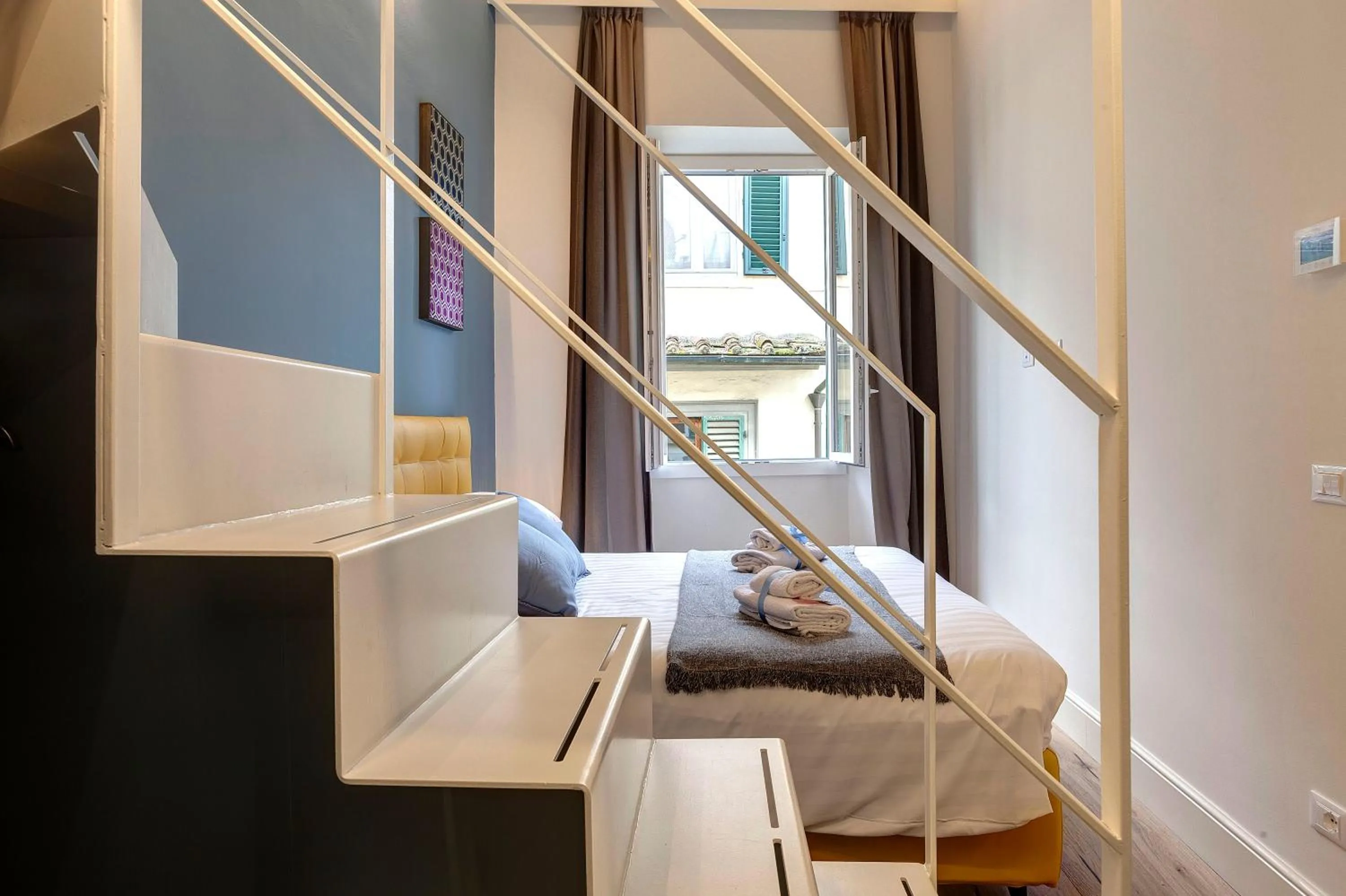 Bed in Turandot Apartment by Mamo Florence