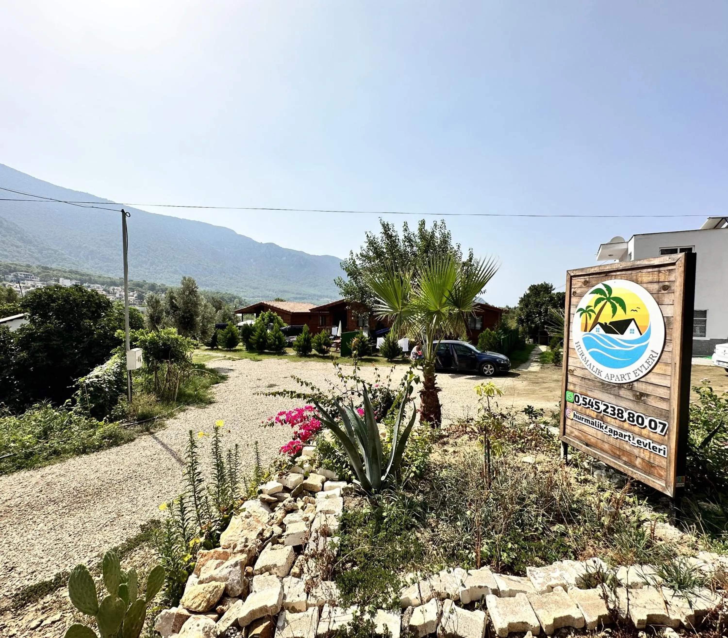 Property building in Hurmalik Aparts & Bungalows - Family Bungalows - Large Garden Bungalow with Barbecue