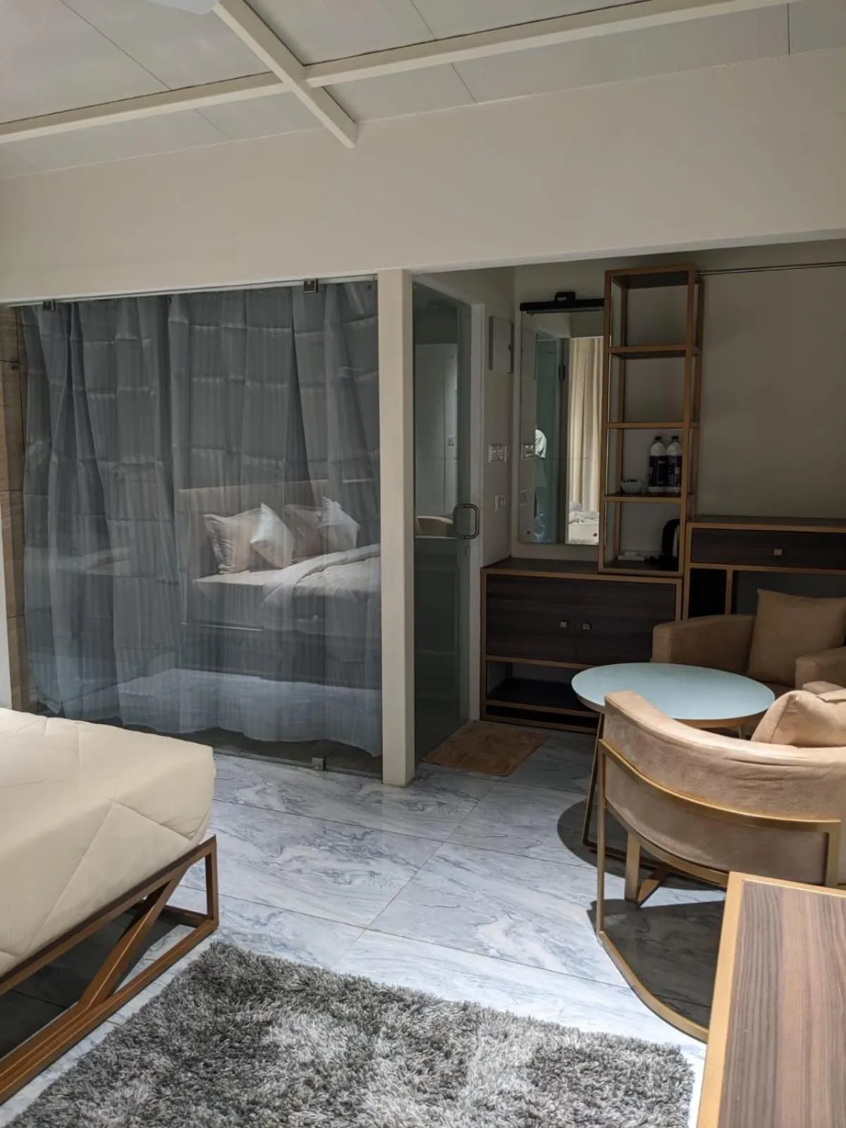 Seating area, Bed in Miracle Hotel and Resorts