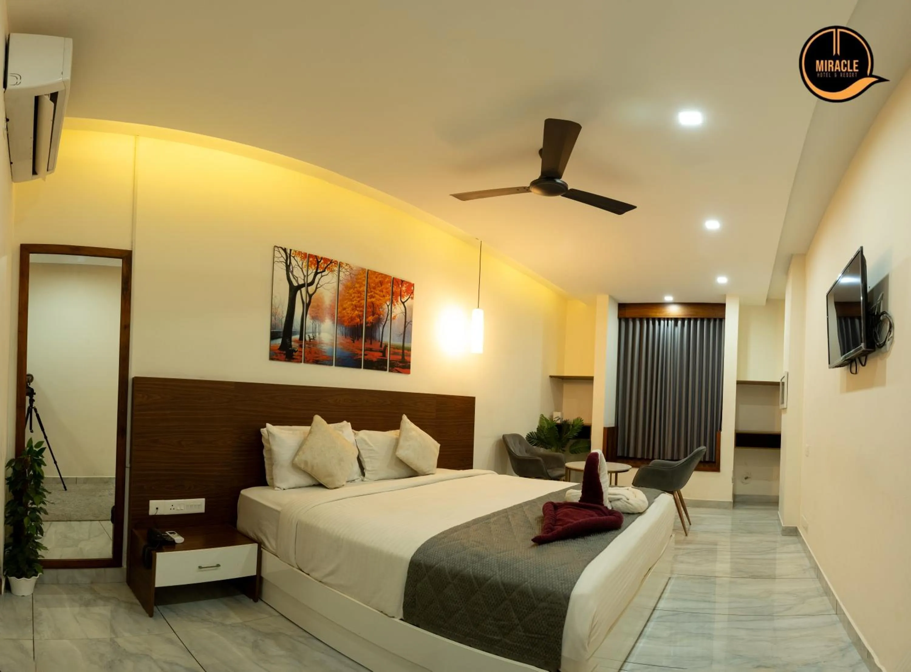 Bed in Miracle Hotel and Resorts