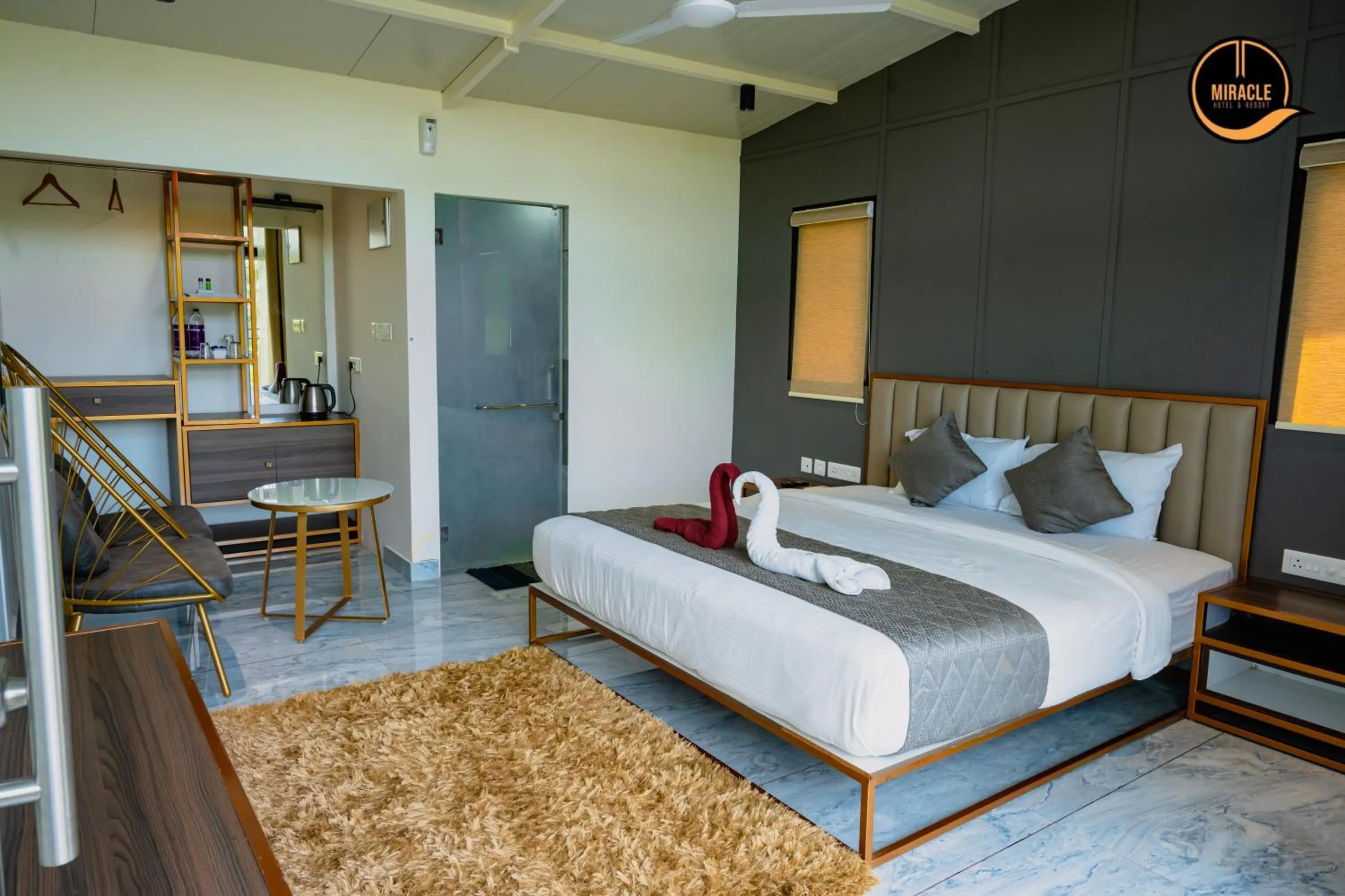 Bed in Miracle Hotel and Resorts