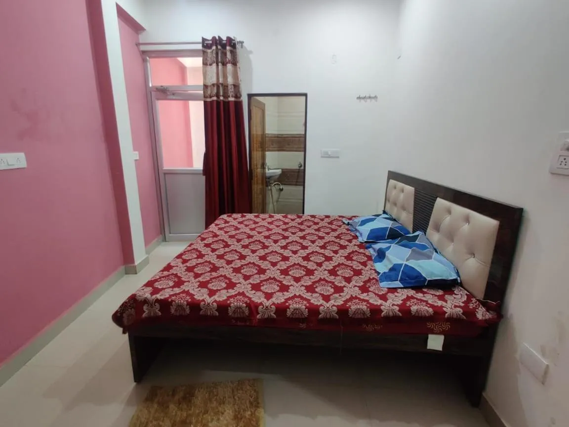 Bed in JK Royal Palace And Lodge