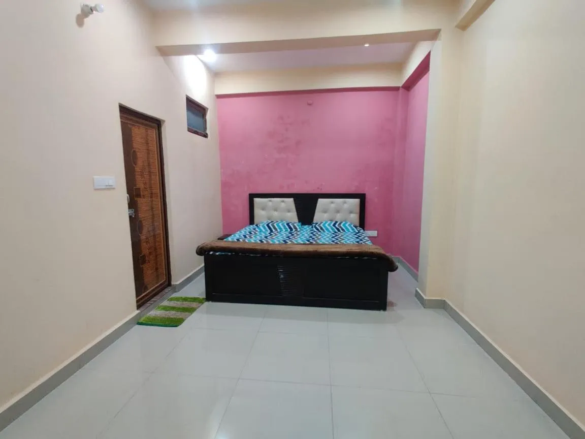 Bed in JK Royal Palace And Lodge