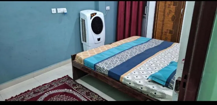 Bed in JK Royal Palace And Lodge