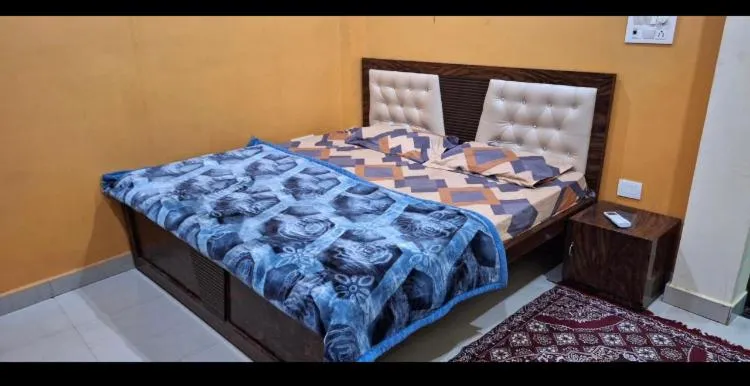 Bed in JK Royal Palace And Lodge