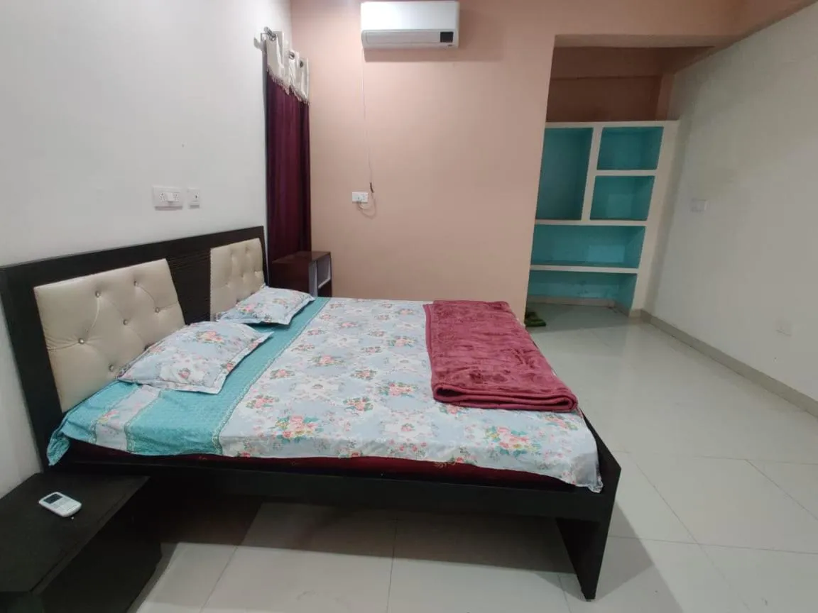 Bed in JK Royal Palace And Lodge