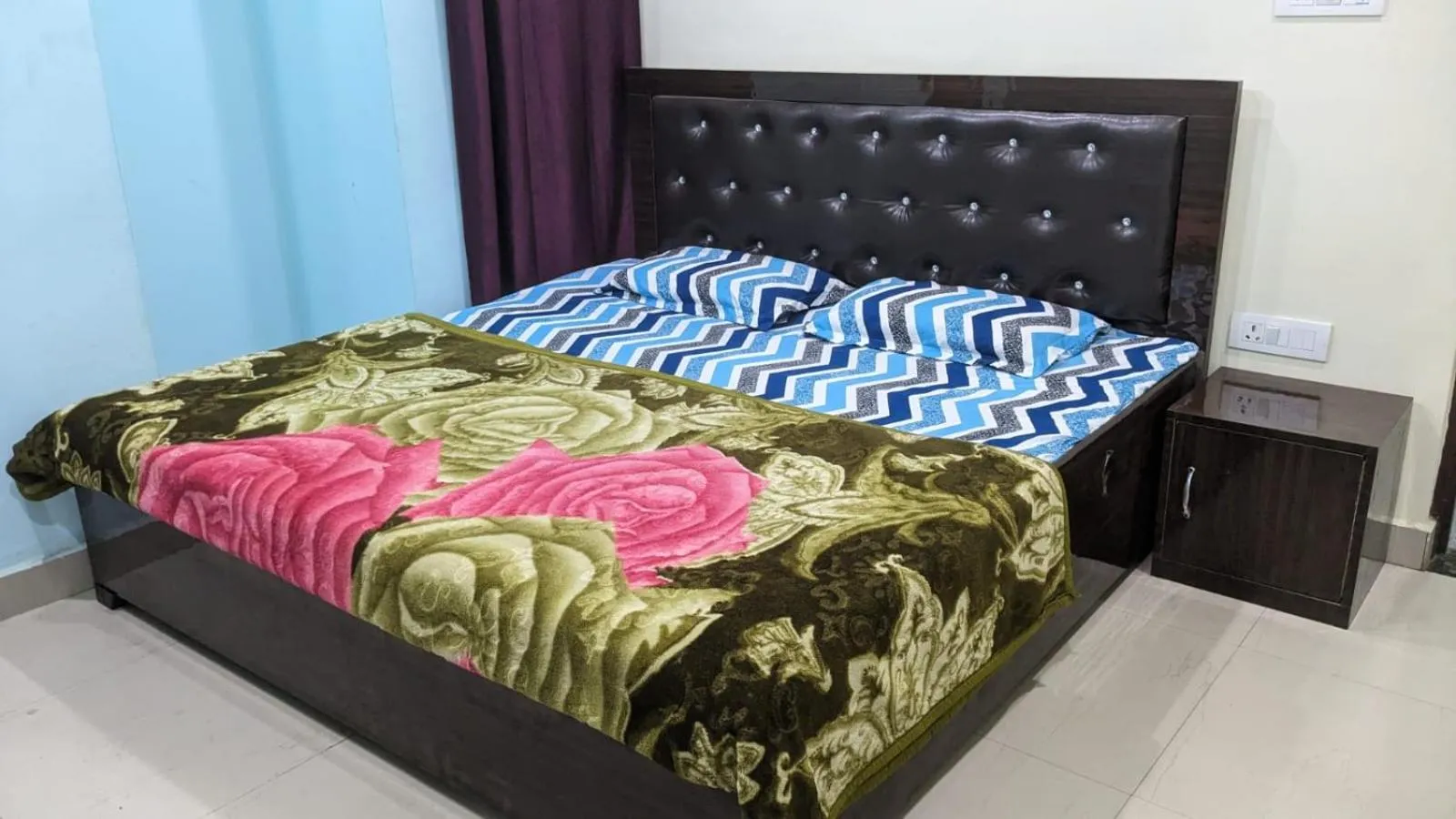 Bed in JK Royal Palace And Lodge