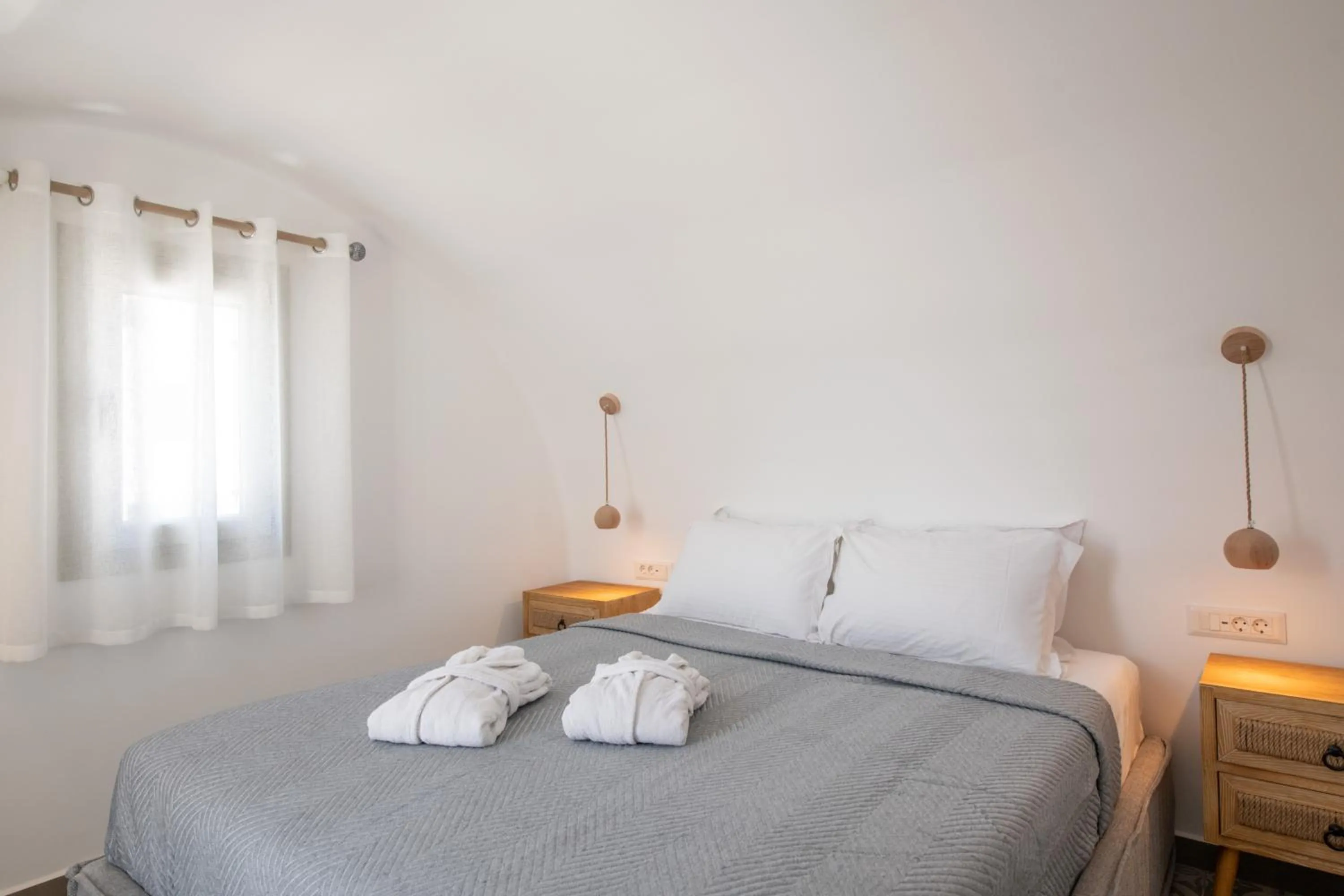 Bed in AVAL All Suite