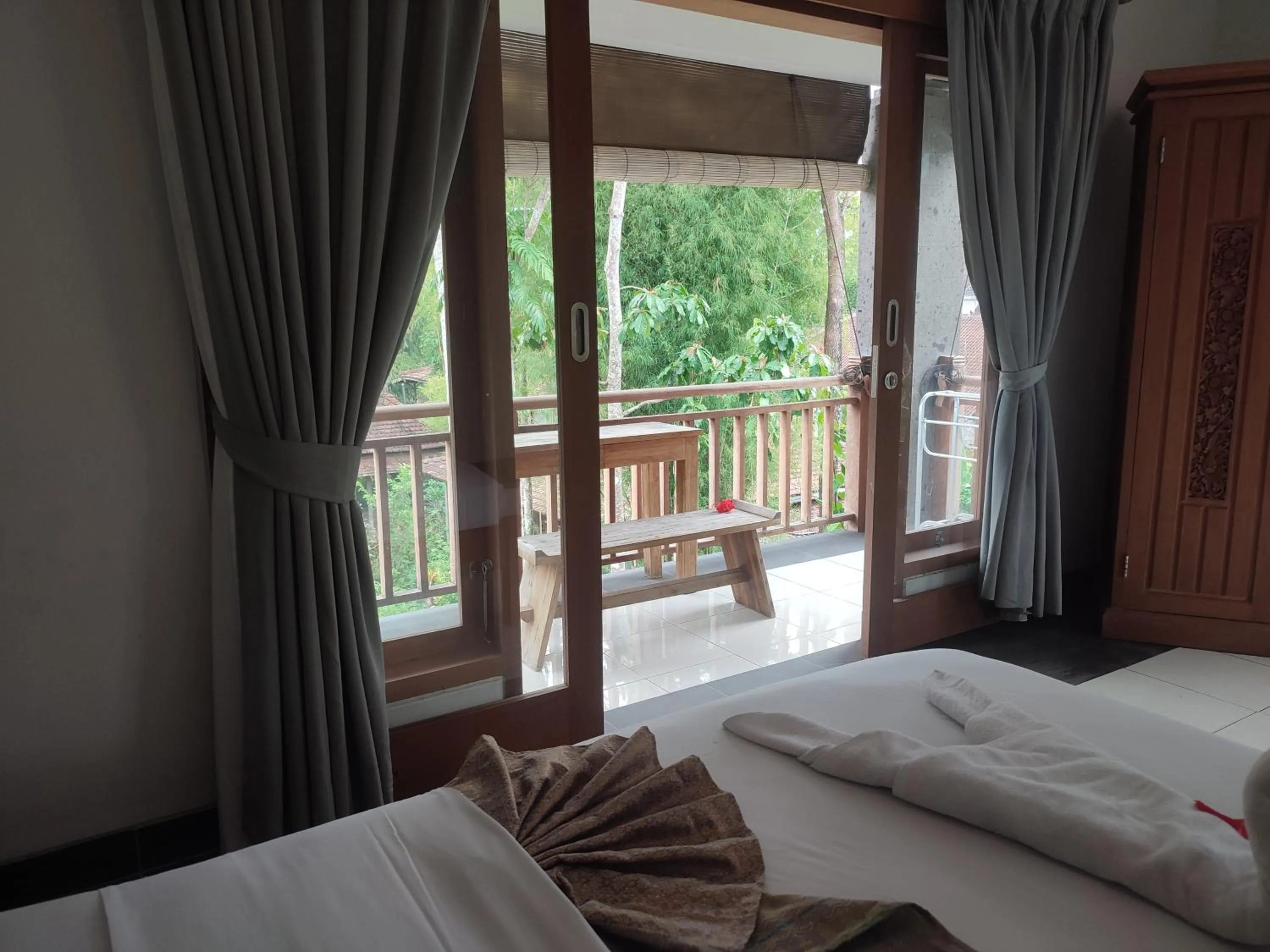 Bed in Nyoman Homestay Ubud