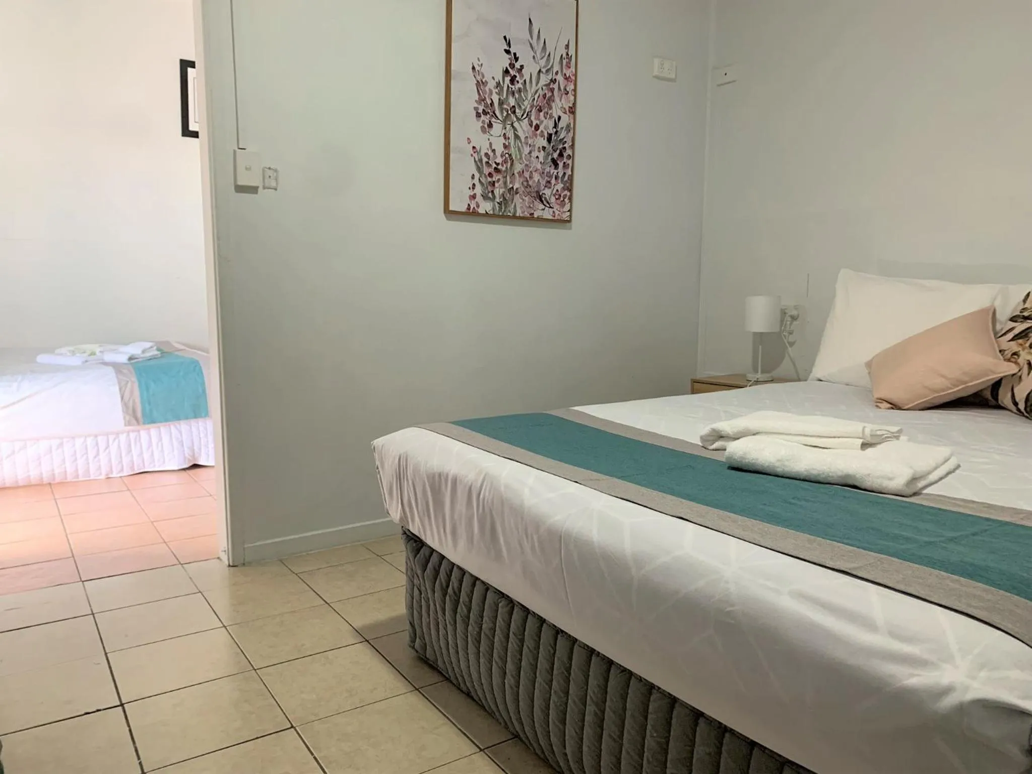 Bed in Aqua Blue Motel