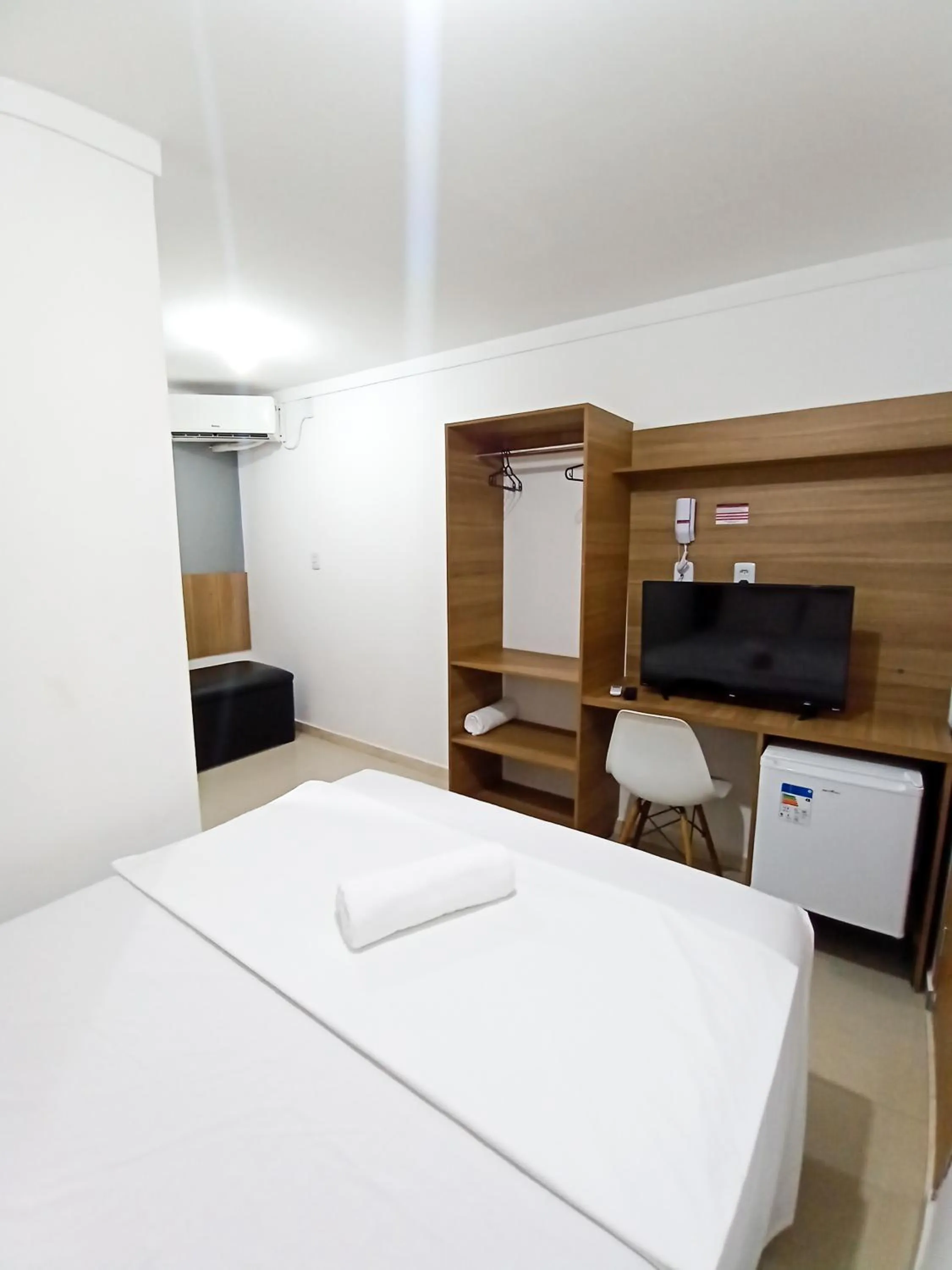 Bed in HOTEL PINHEIRO CENTER