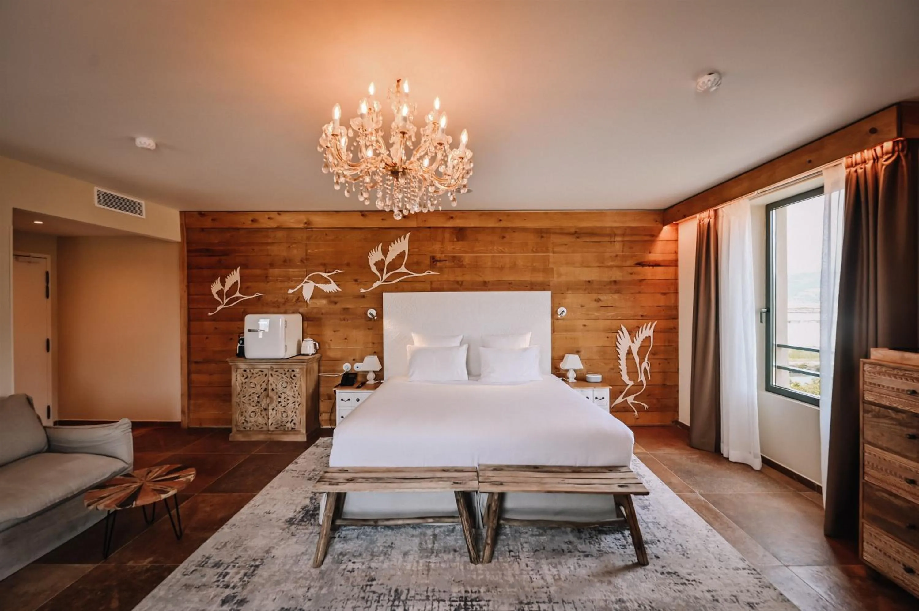 Bed in Le Hameau Des Pesquiers Ecolodge & Spa, Curio Collection By Hilton