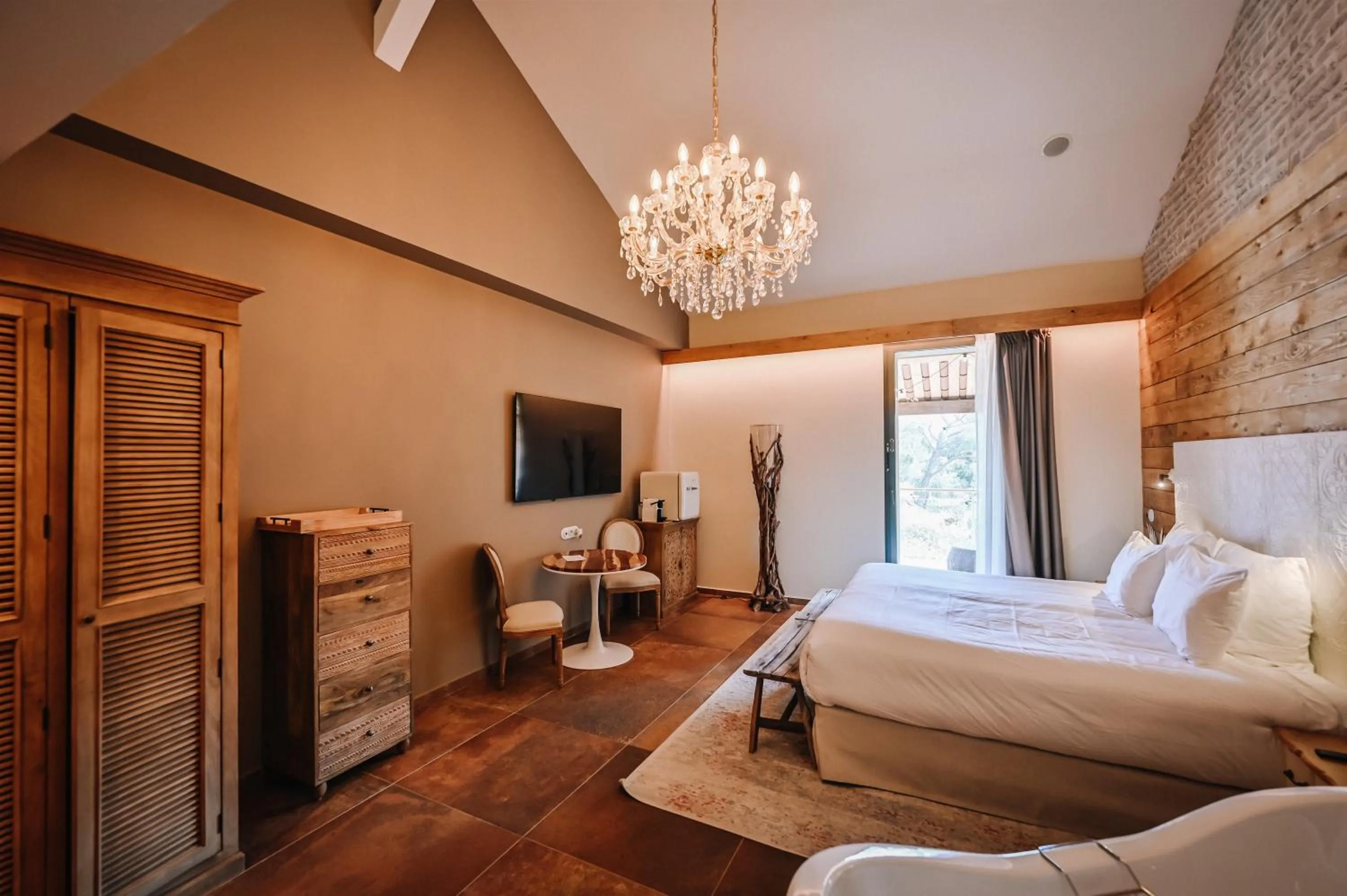 Photo of the whole room, Bed in Le Hameau Des Pesquiers Ecolodge & Spa, Curio Collection By Hilton