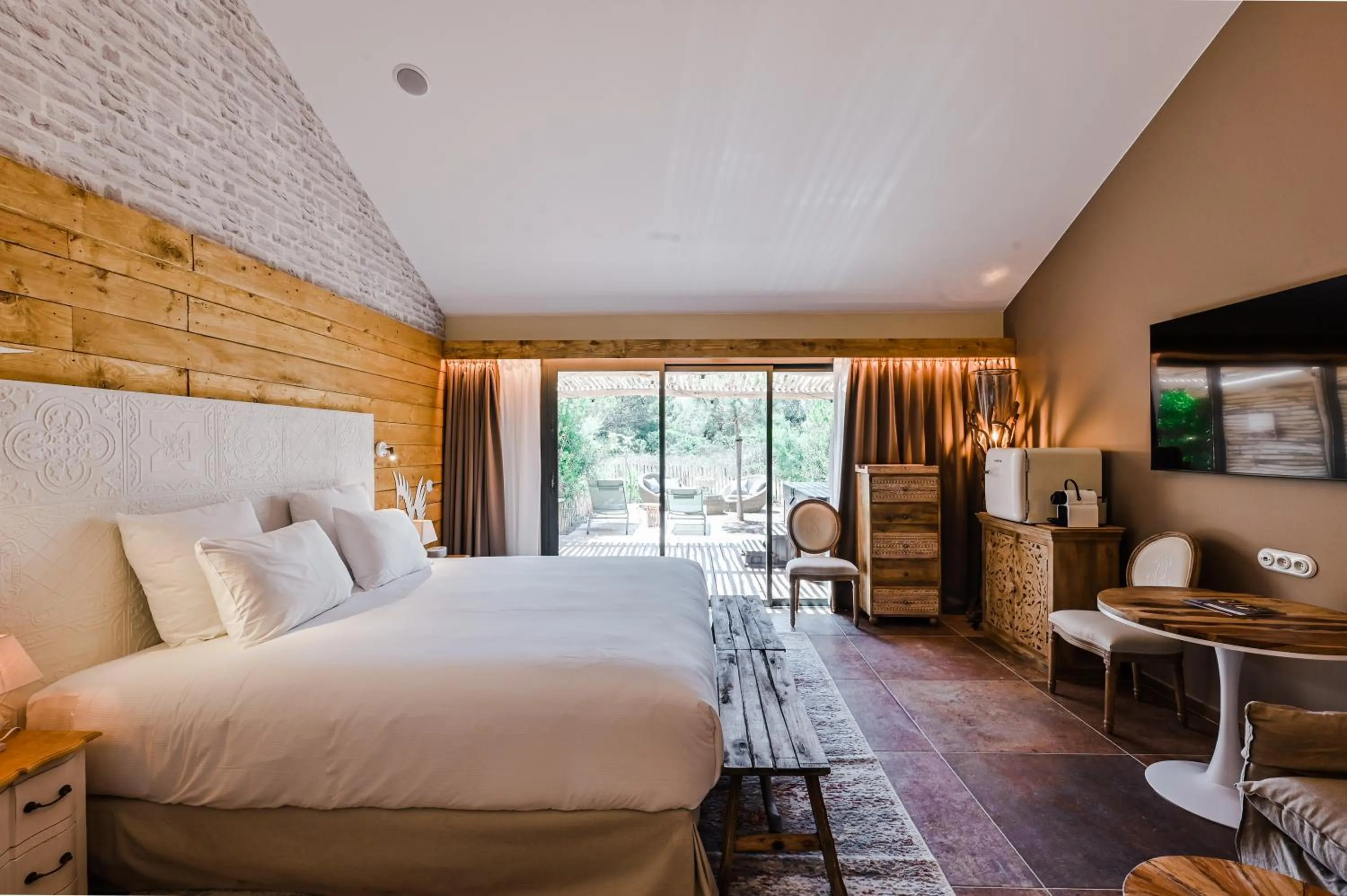 Bed in Le Hameau Des Pesquiers Ecolodge & Spa, Curio Collection By Hilton