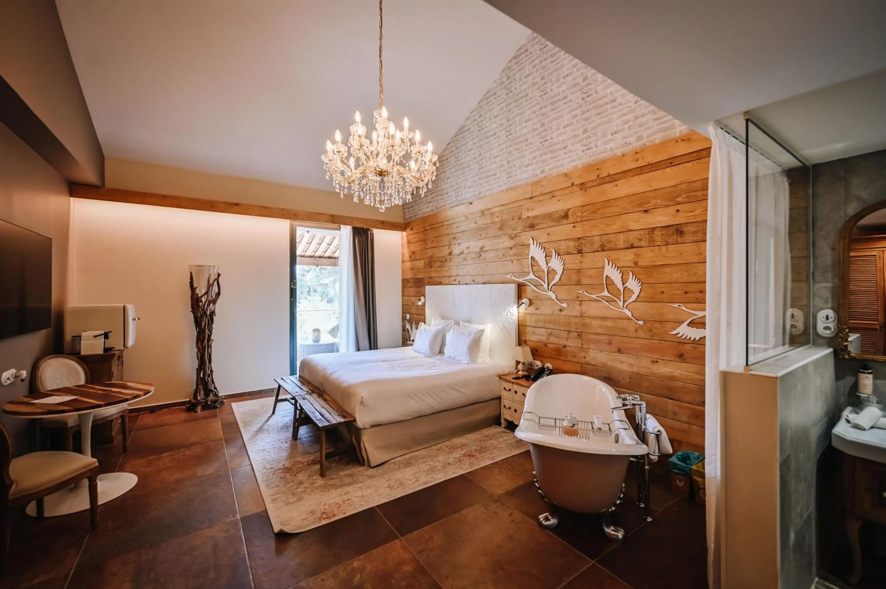 Photo of the whole room, Bed in Le Hameau Des Pesquiers Ecolodge & Spa, Curio Collection By Hilton