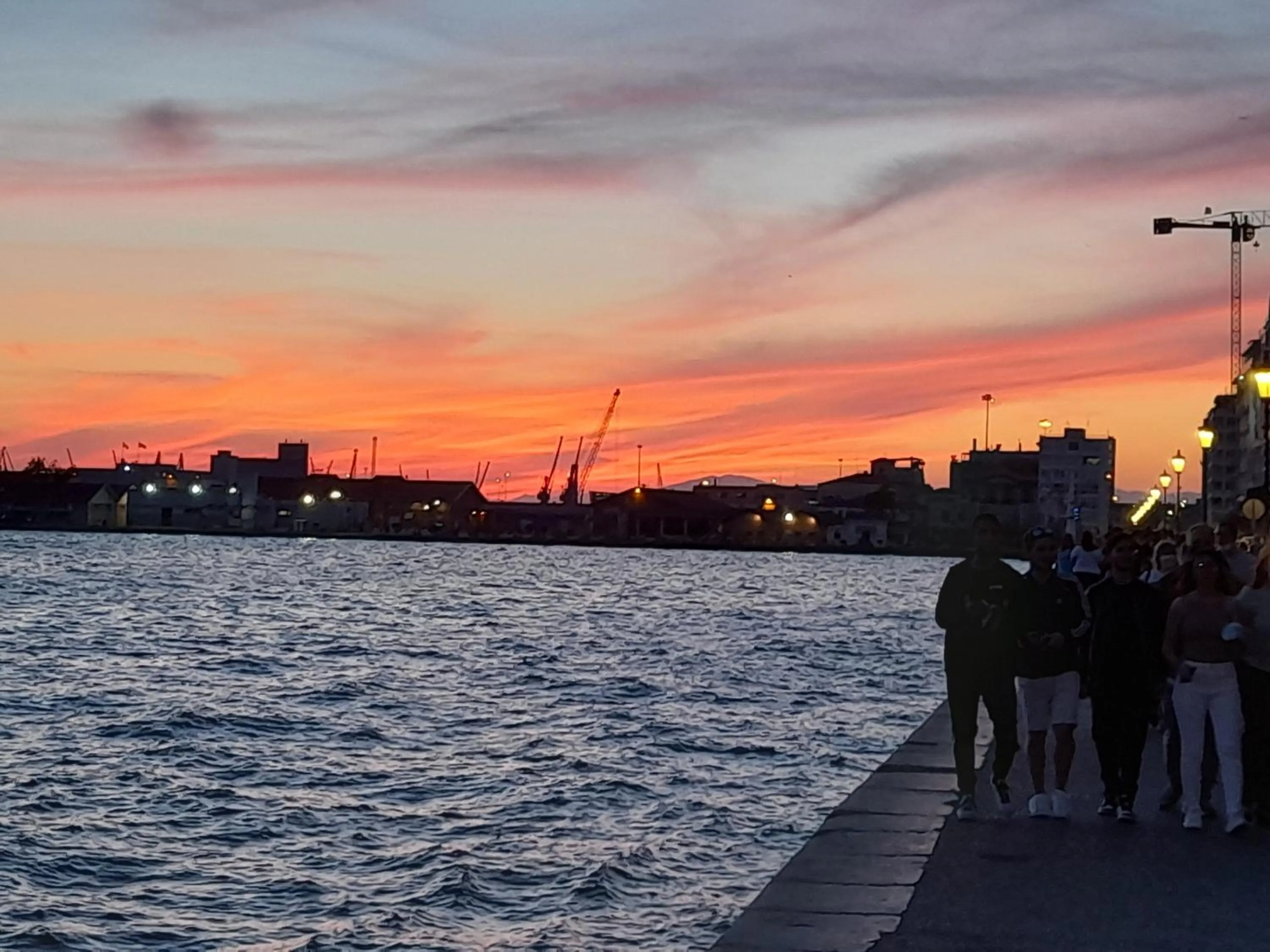 People in Black Onyx Comfort Suites - Elegant Stay- City Center Next to Airport Bus