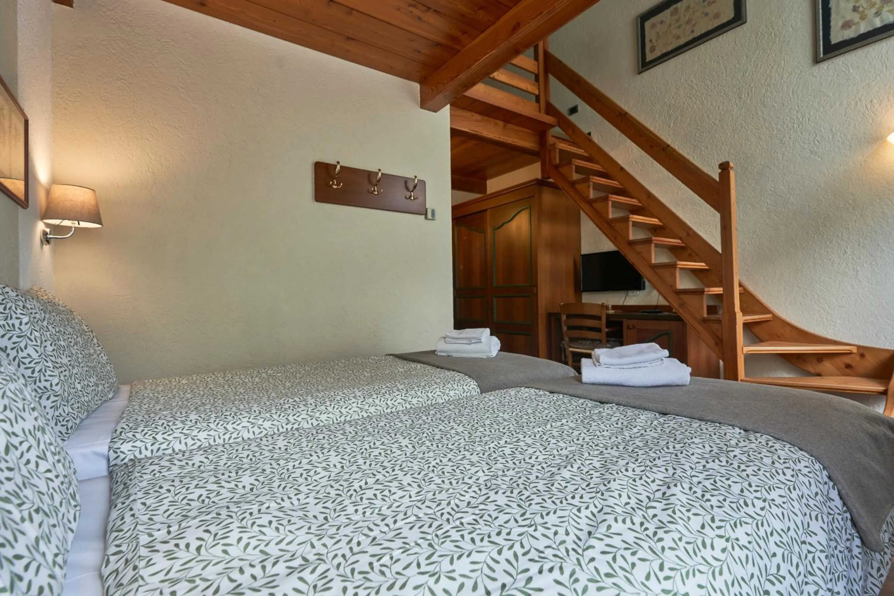 Photo of the whole room, Bed in Hotel Walser Courmayeur