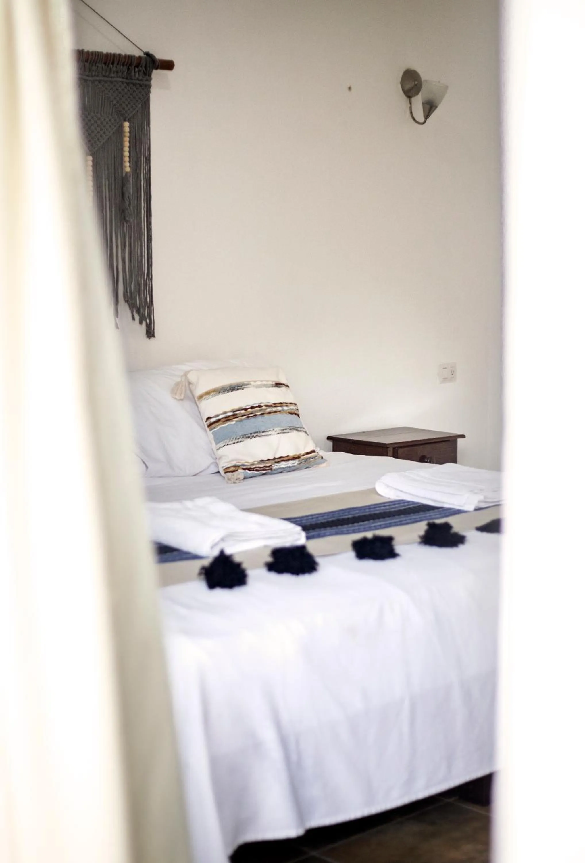 Photo of the whole room, Bed in hotel stella maris tulum