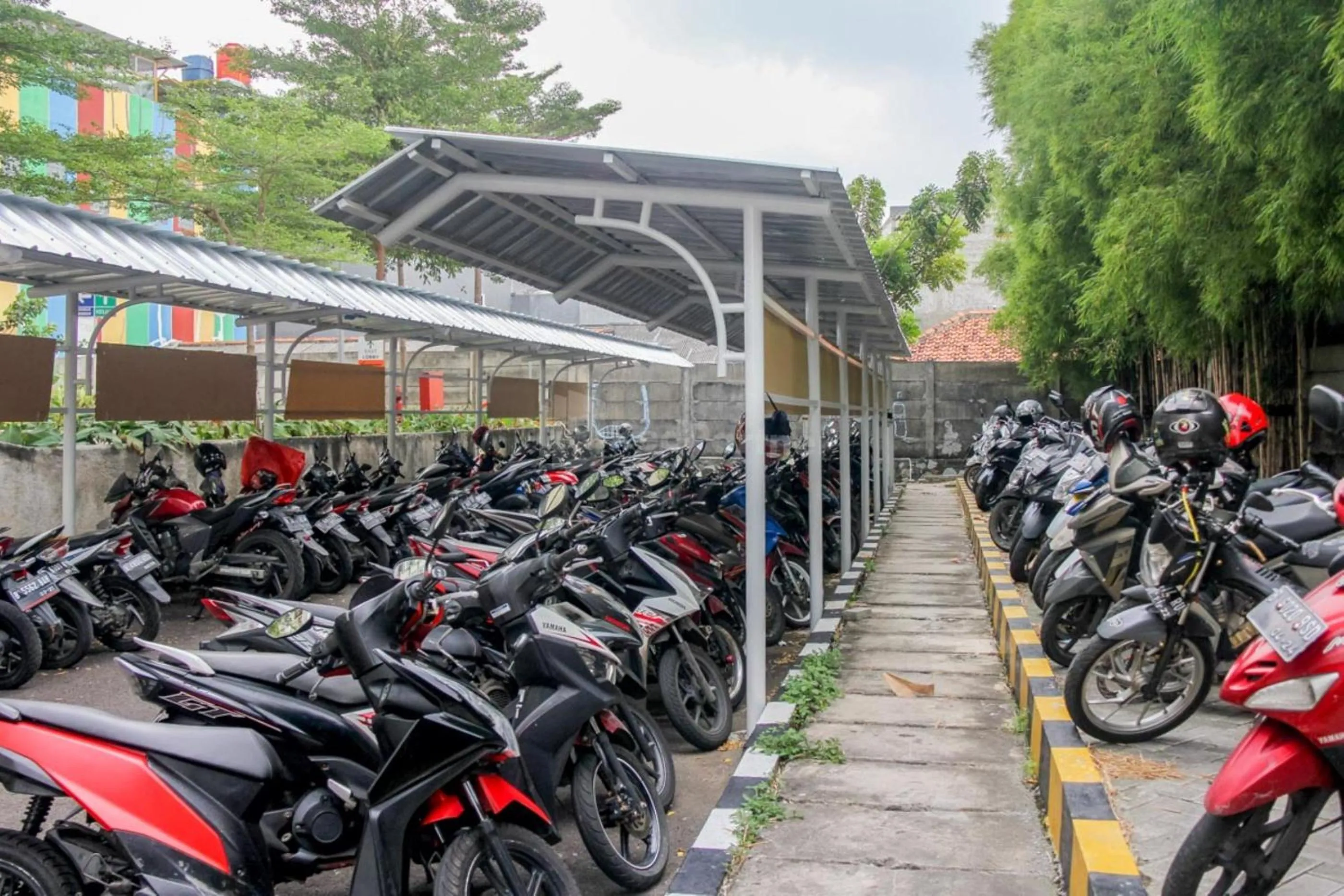 Parking in RedLiving Apartemen Paradise Mansion - Gunawan