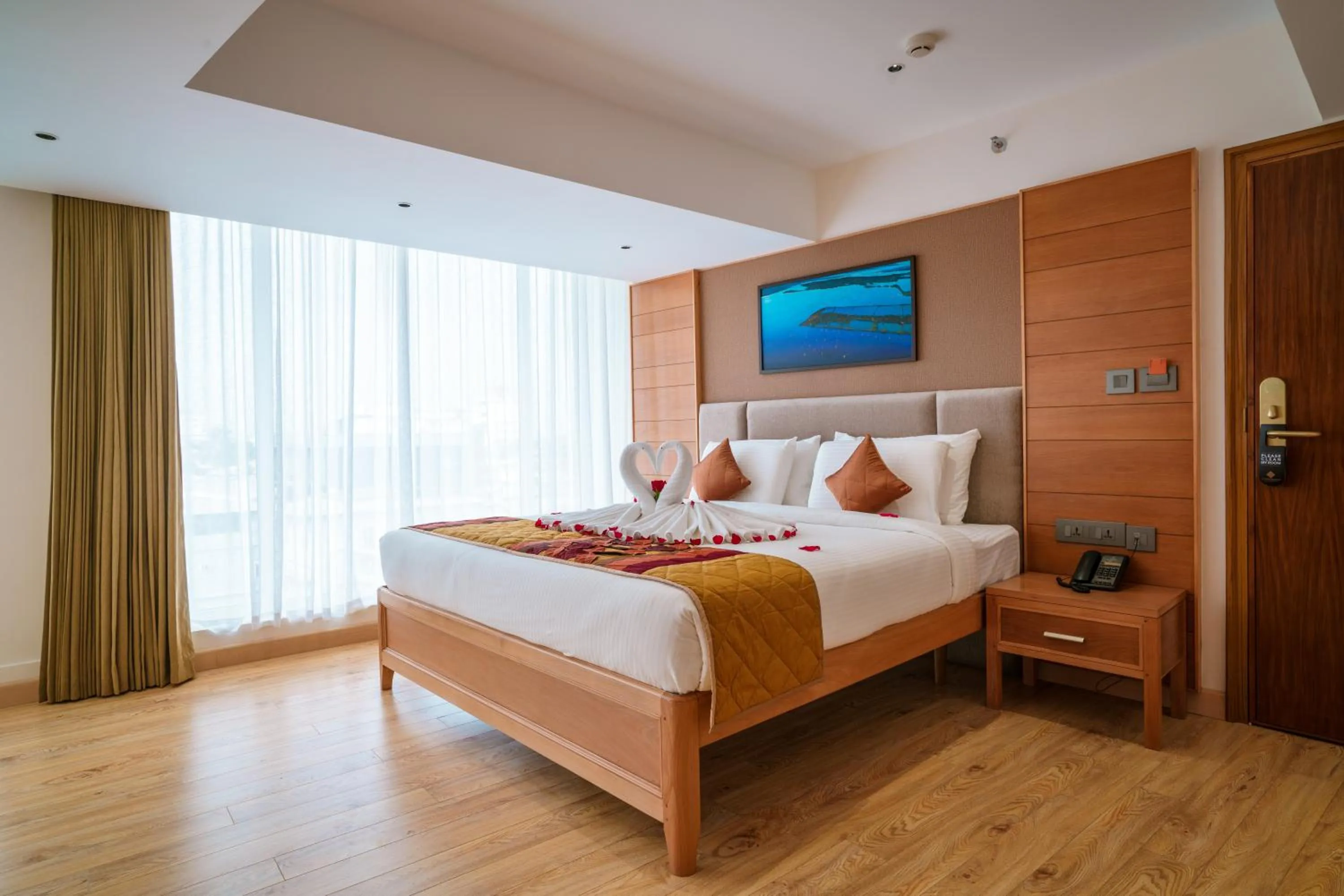 Bed in Townbridge Hotels & Suites