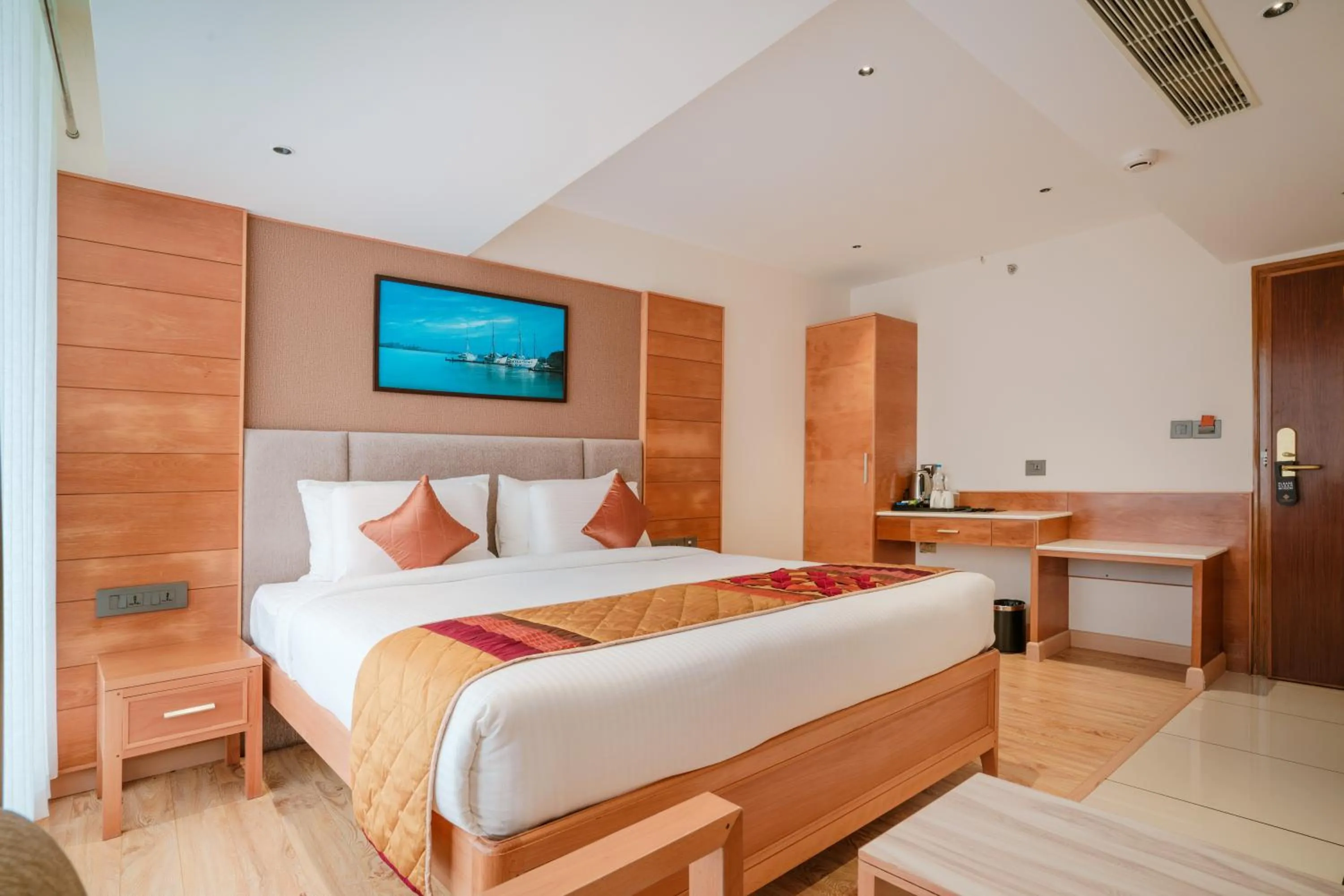 Bed in Townbridge Hotels & Suites