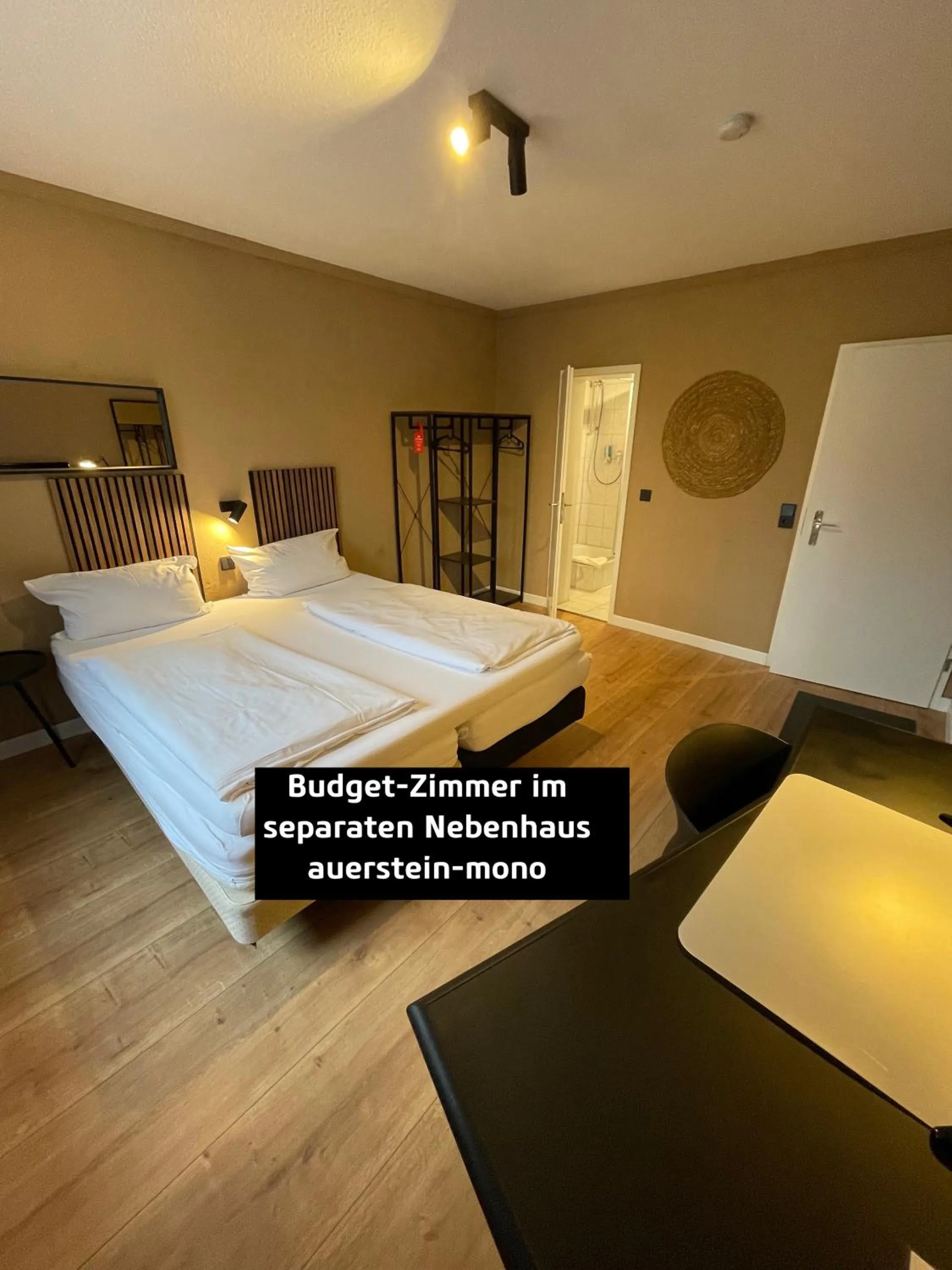 Bed in AUERSTEIN-Hotels auerstein & auerstein-mono