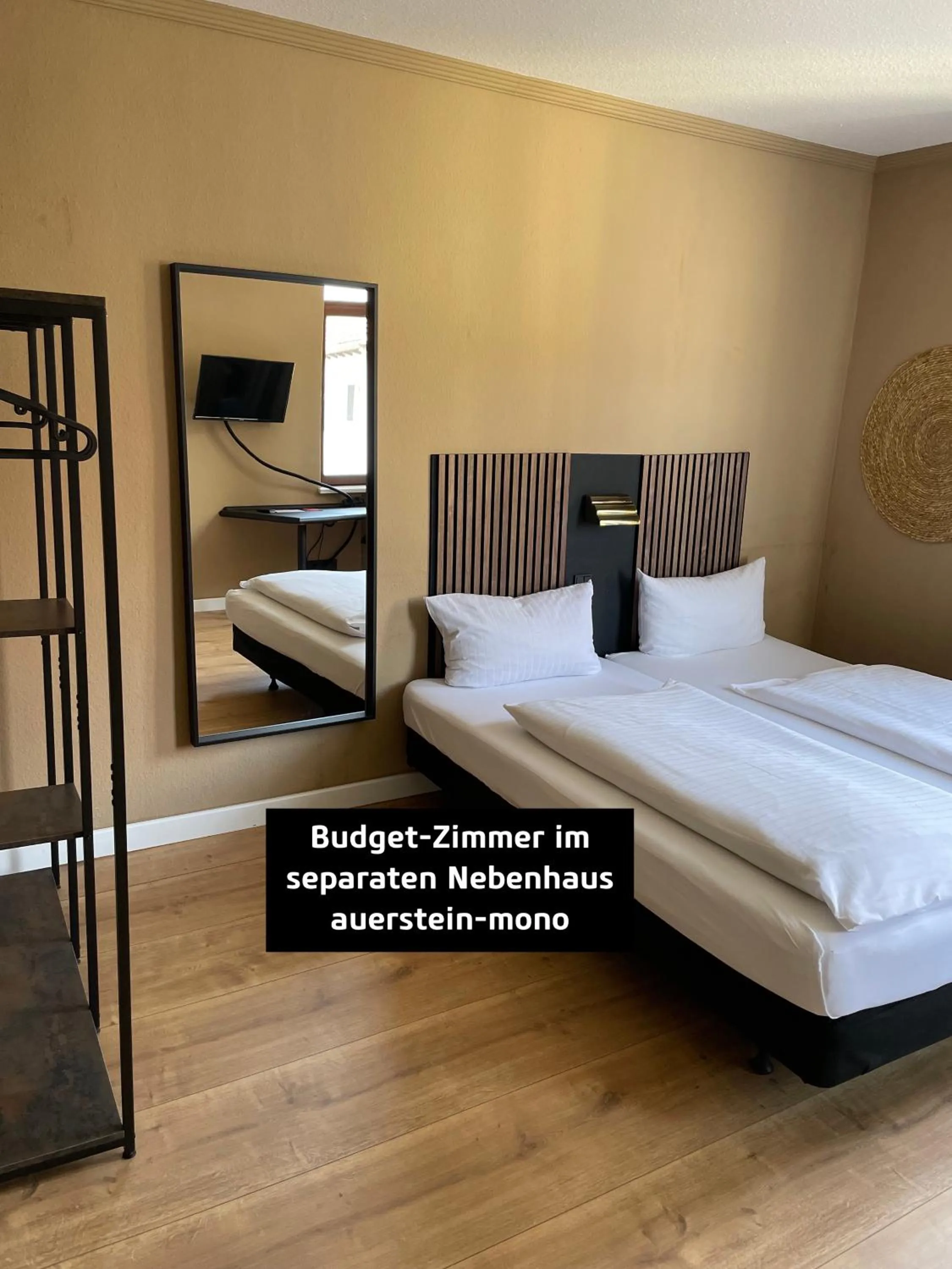 Bed in AUERSTEIN-Hotels auerstein & auerstein-mono