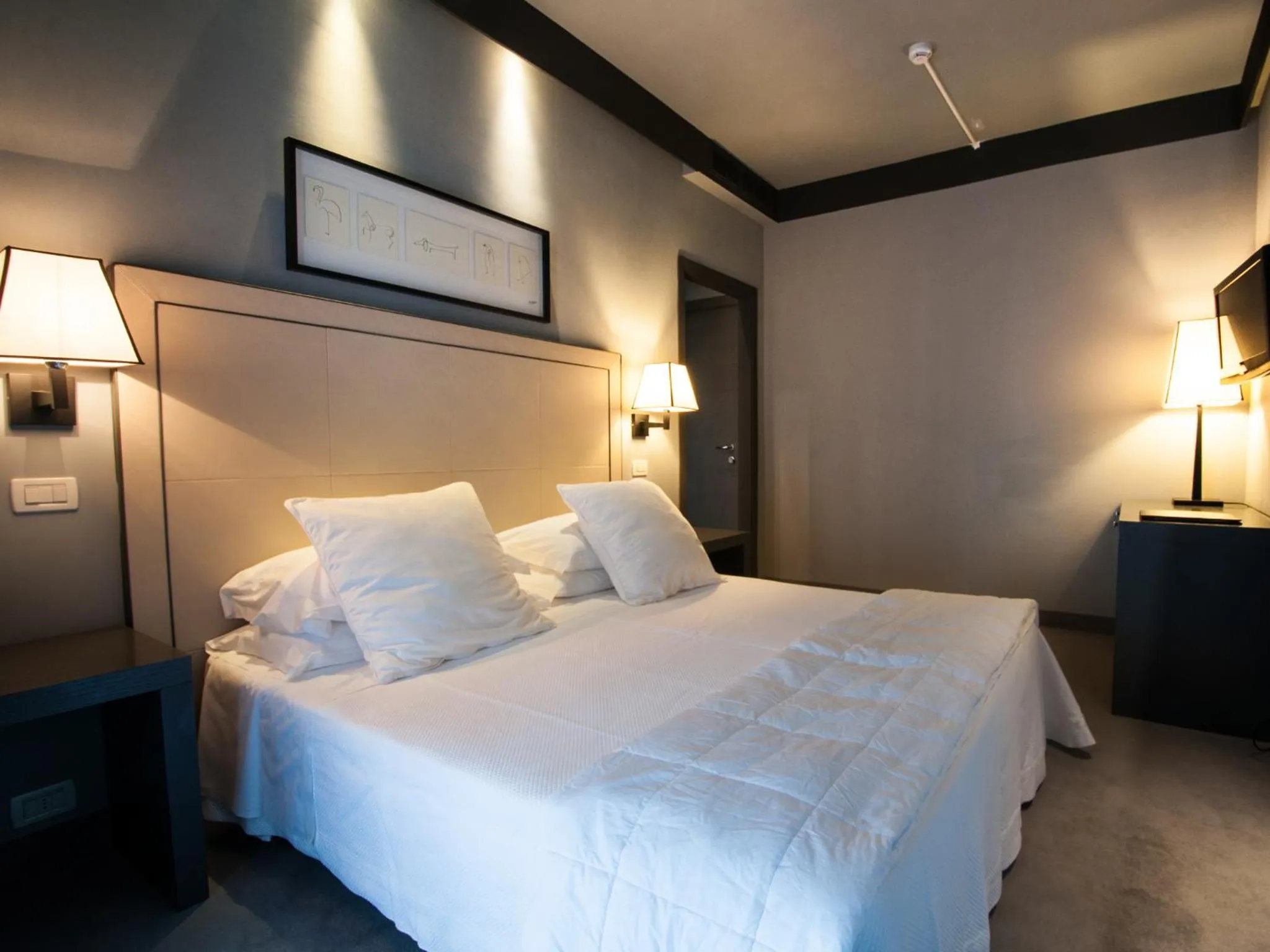 Bed in Hotel Michelangelo & Day SPA