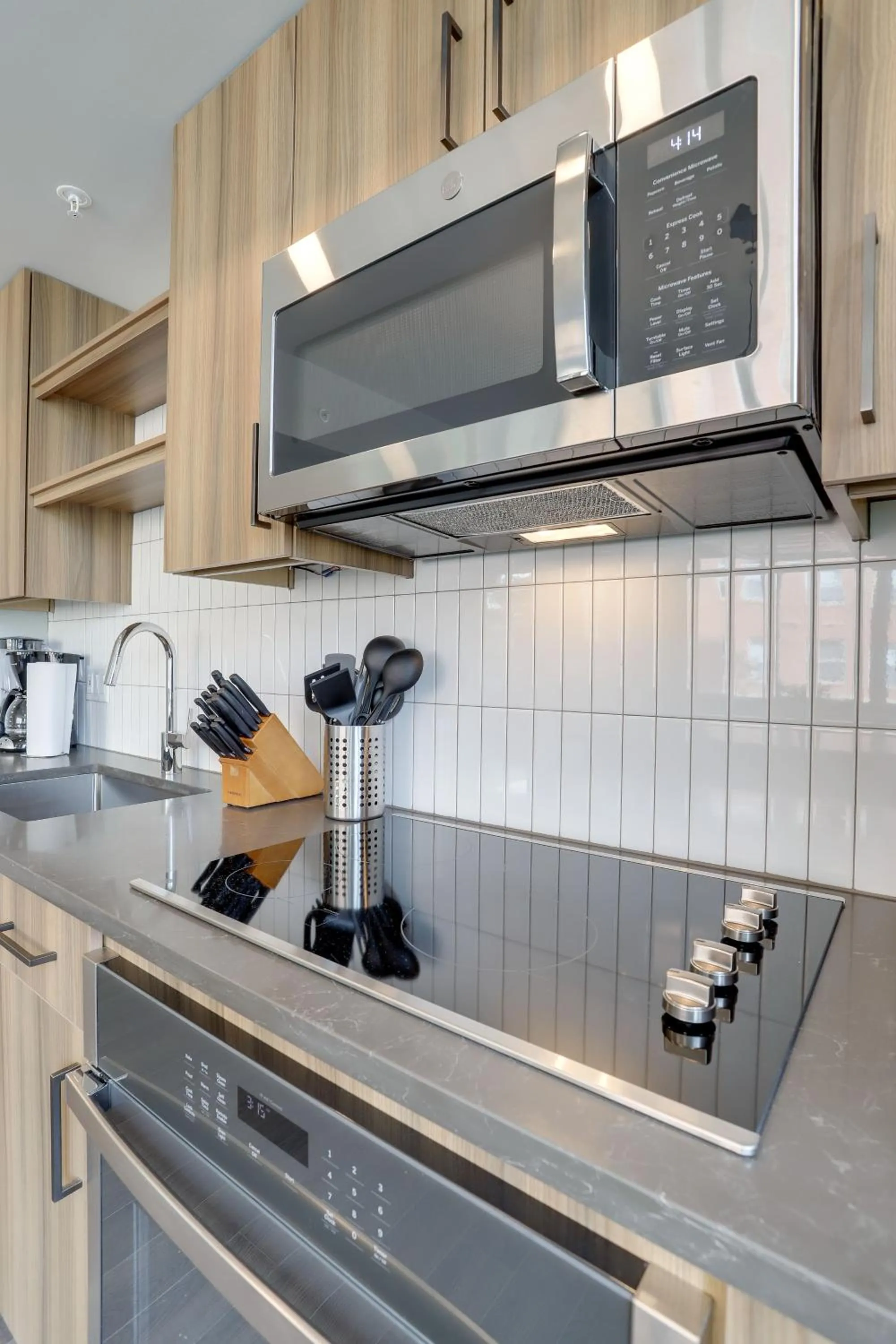 kitchen in Stylish Condo at Clarendon with Rooftop Views